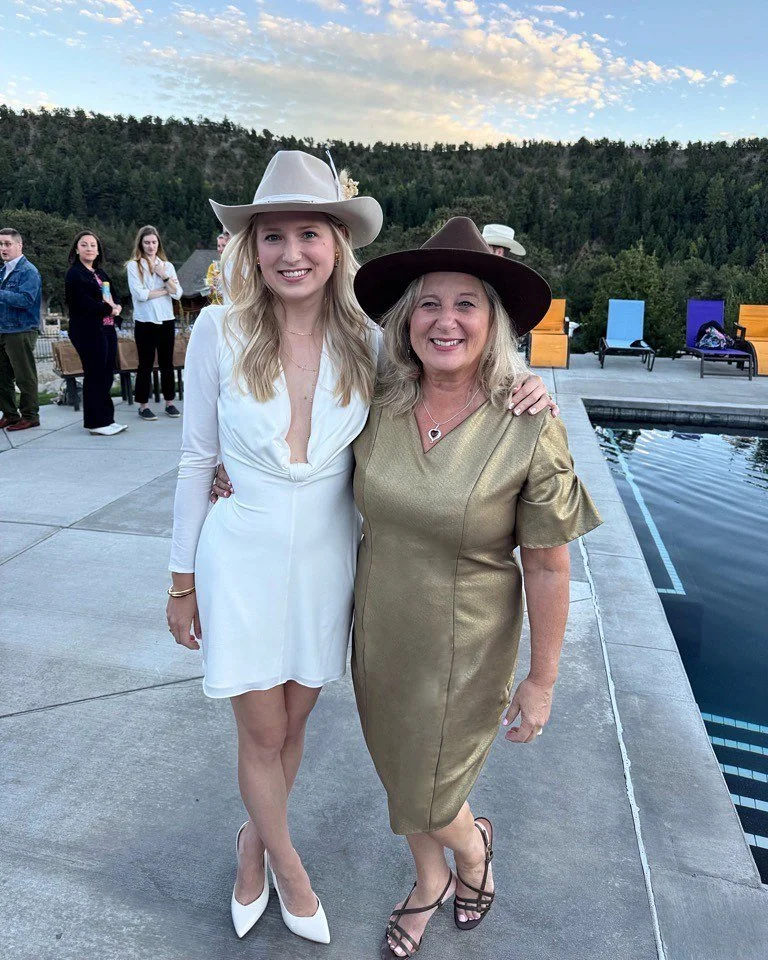 To celebrate her daughter&rsquo;s wedding at Deer Valley Ranch in Colorado, Sue requested a &ldquo;pool party&rdquo; custom dress that could fit in with the wedding location. 

We chose this gold foil cotton, and designed a classic v-neck dress with 