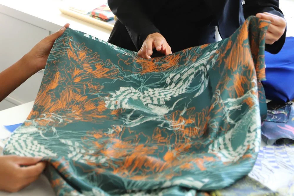 Selecting fabrics with a fashion designer