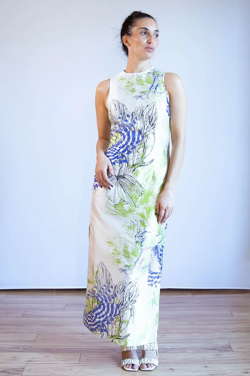 White sleeveless gown with a bird pattern