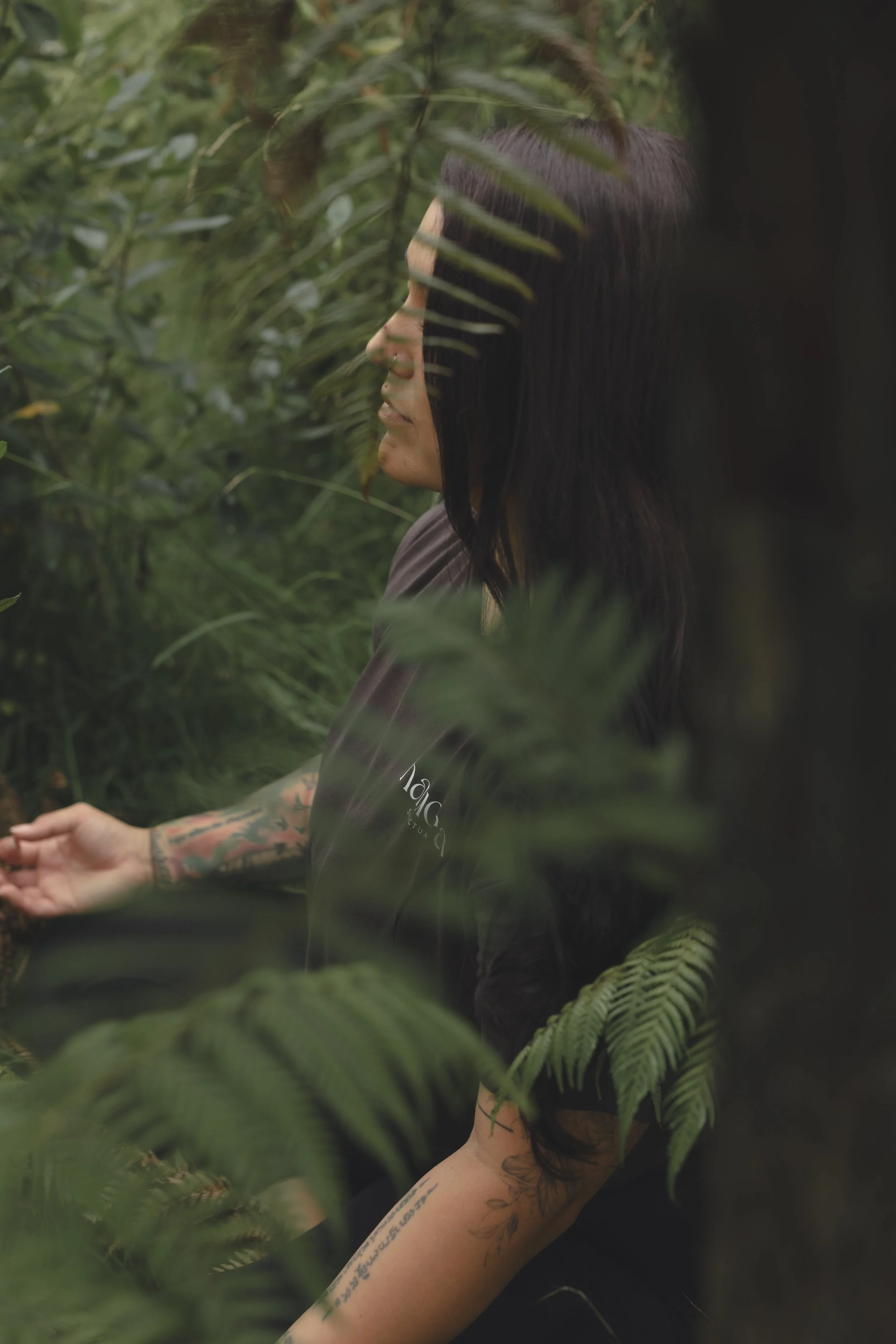 Amy Watts in native trees. 