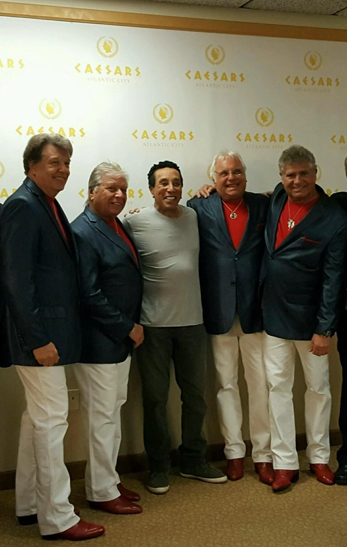 The band backstage with Smokey Robinson