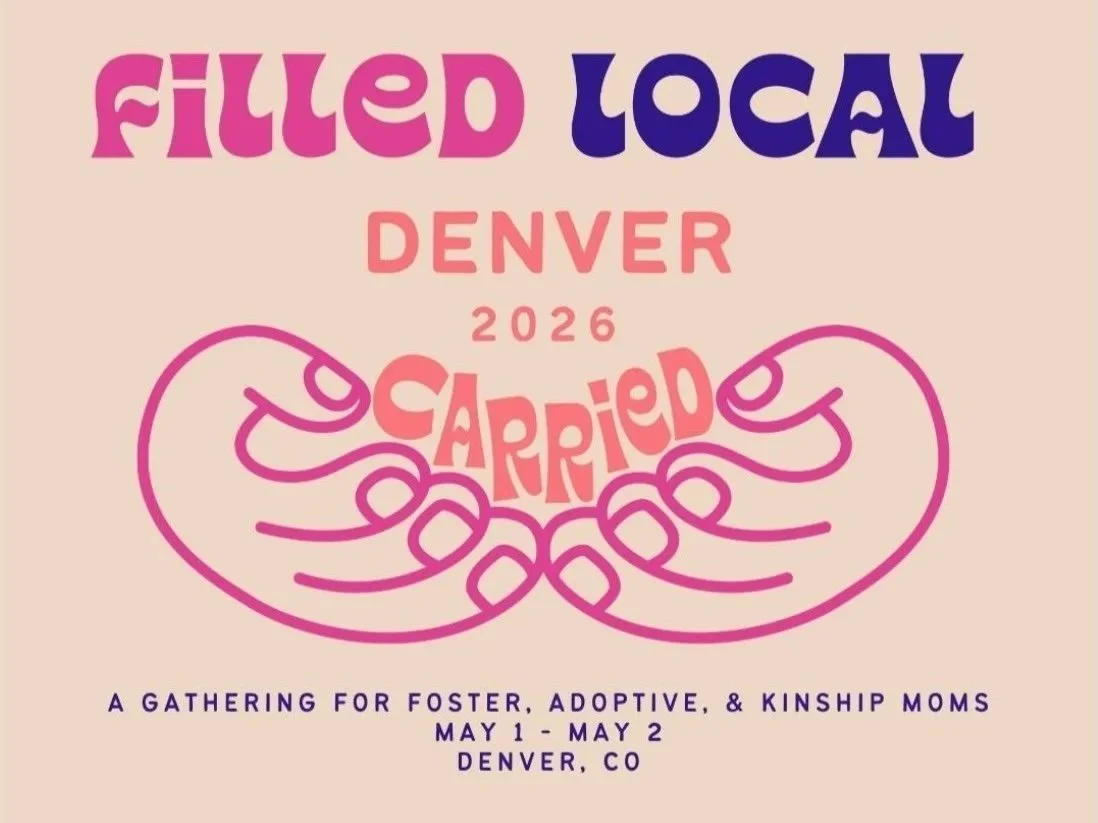 Pink and purple text on a beige background reads "Filled Local Denver 2026" with a heart-shaped design made of two hands holding a word "Carried". Additional text states "A gathering for foster, adoptive, & kinship moms, May 1 - May 2, Denver, CO."