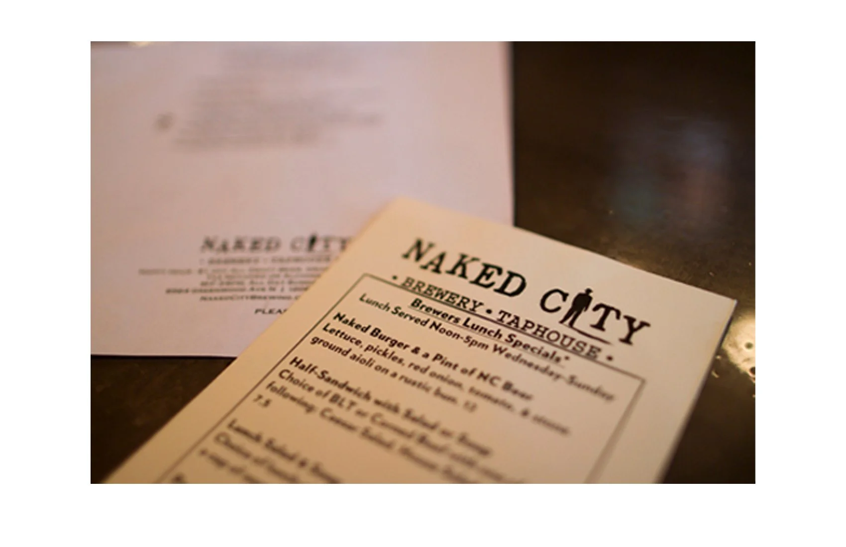 Developed logotype and comprehensive brand identity for Naked City Brewery and Taphouse.