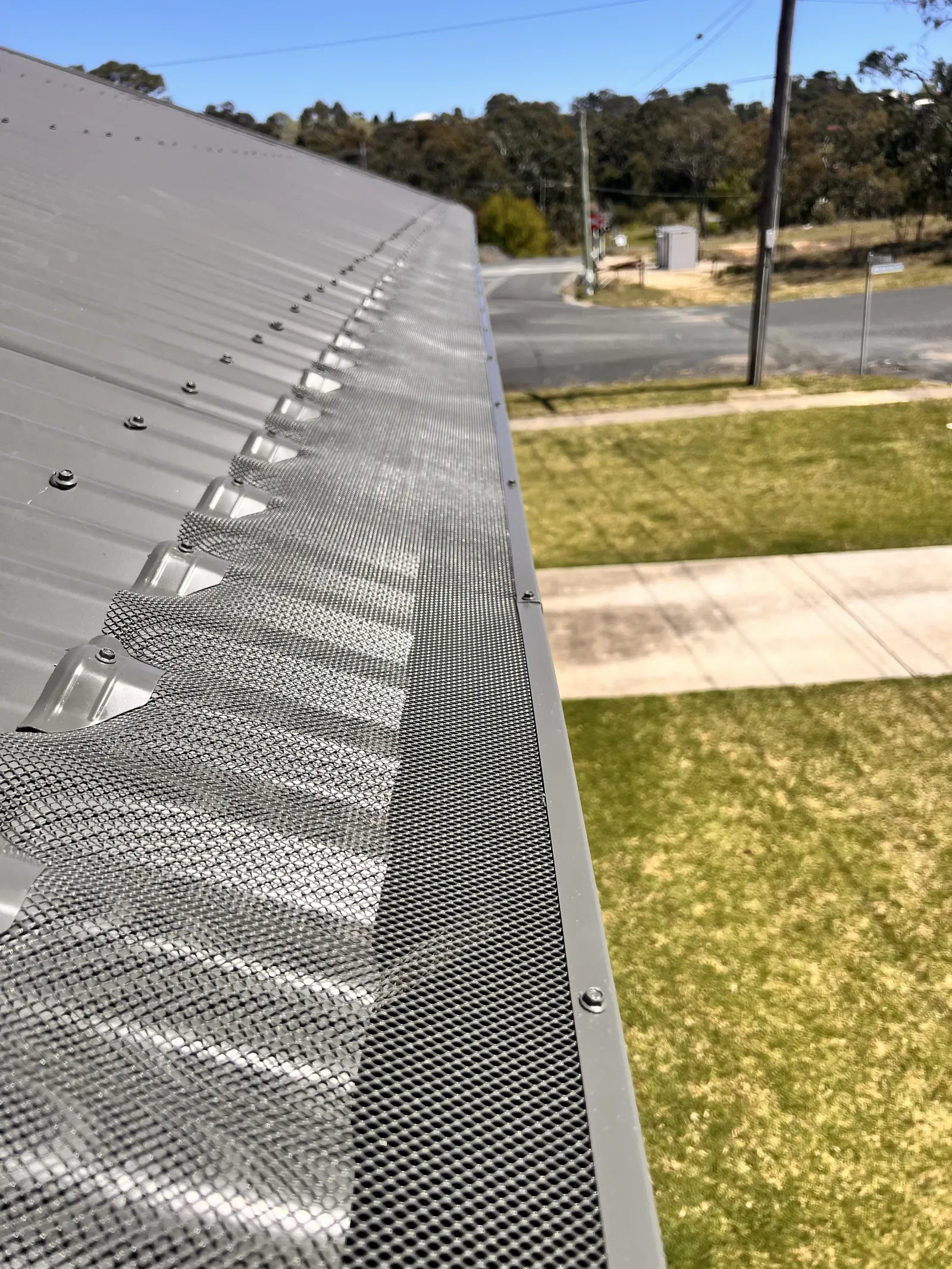 Metal roof in Wollongong with gutter guards installed to stop birds nesting