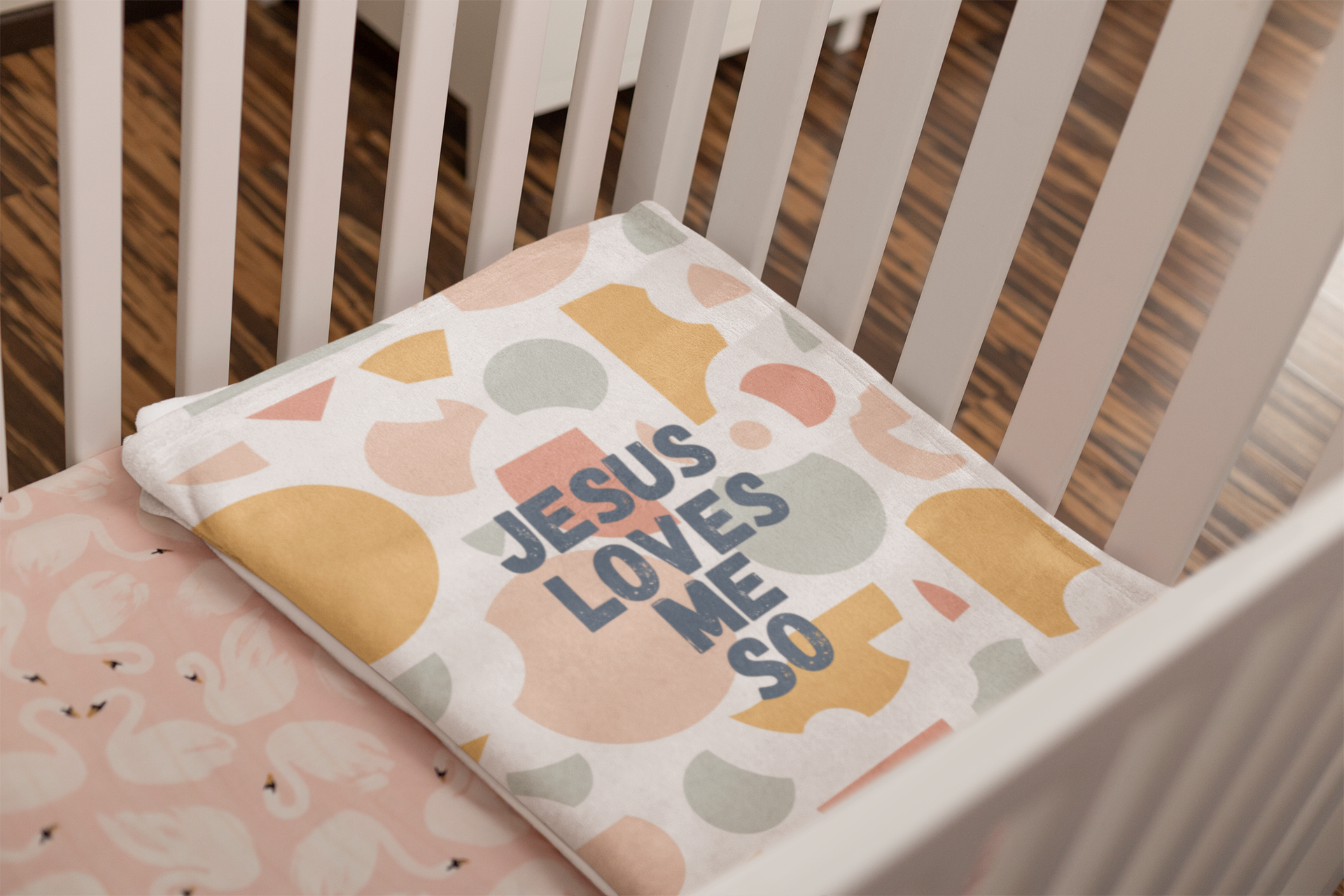 mockup-of-a-folded-throw-blanket-on-a-girl-s-cradle-24696.png