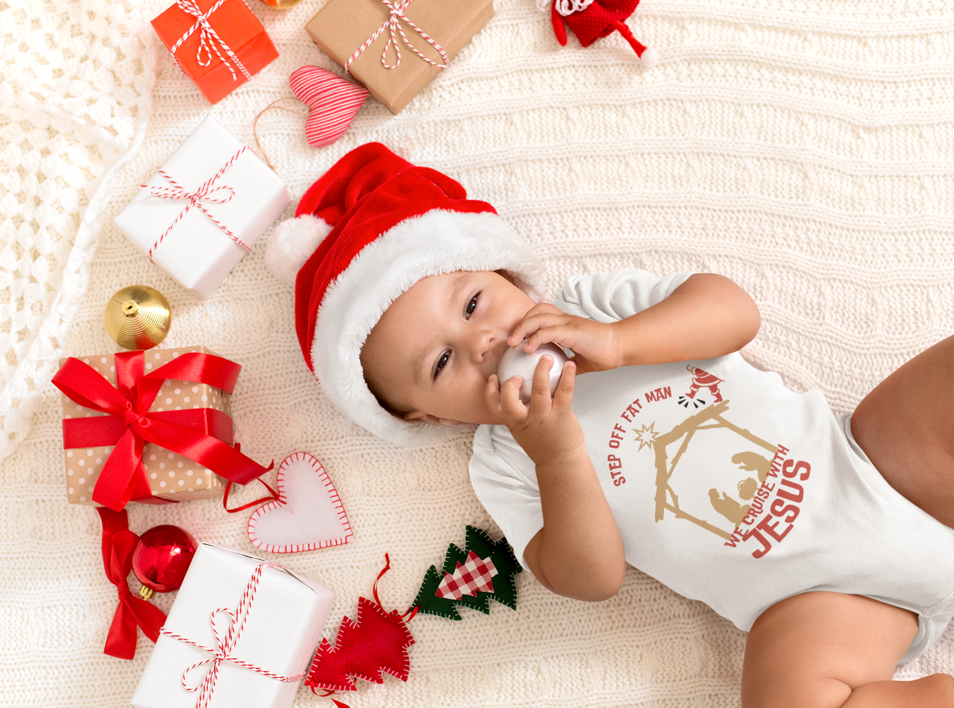 xmas-themed-mockup-of-a-sweet-baby-wearing-a-onesie-m10808-r-el2.png