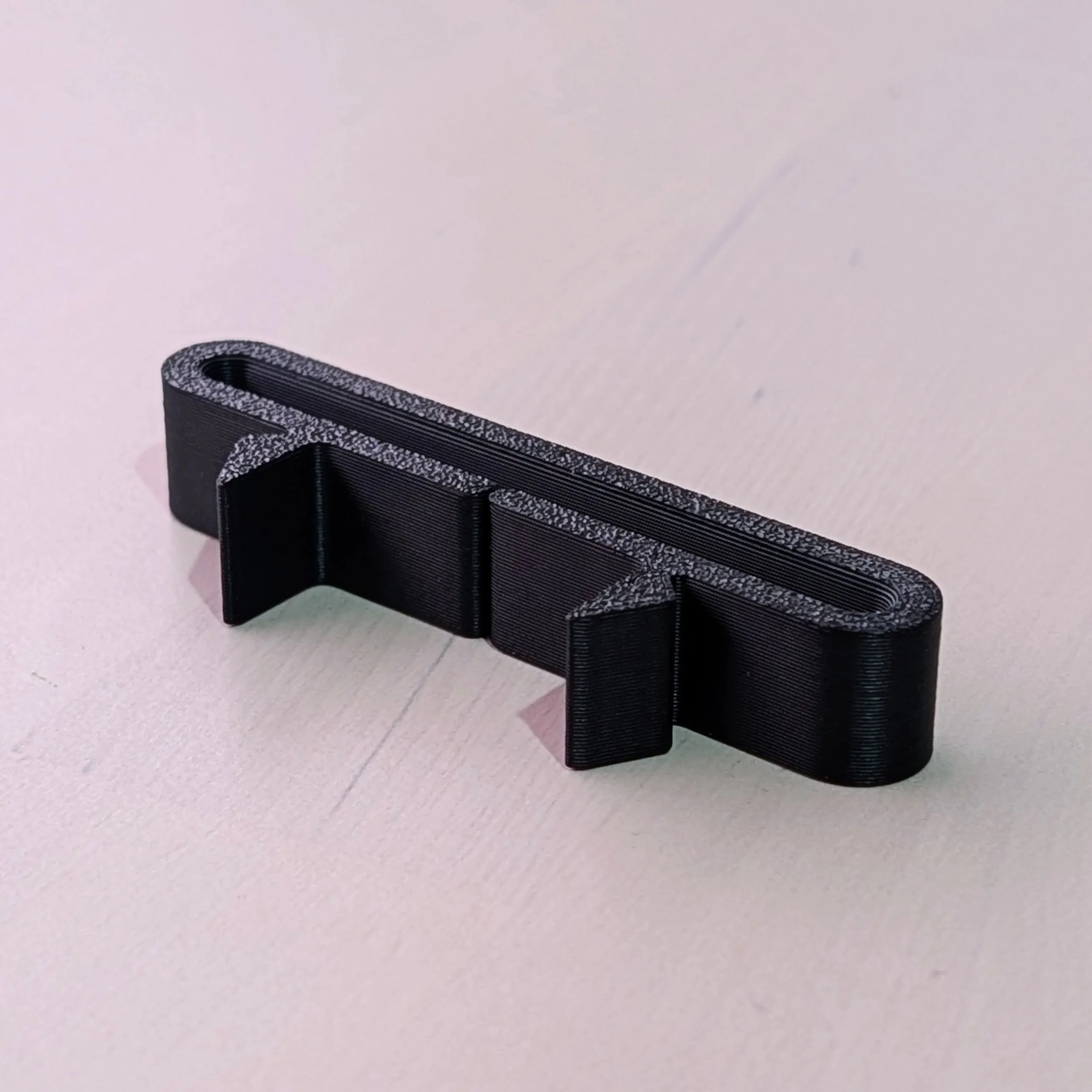 Little restoration part I made for the S13 seat belts. From the factory, the front seats have a seat belt guide integrated in the seat belt assembly, but due to compliance or age they're often damaged or missing entirely. This makes sure the belt is 