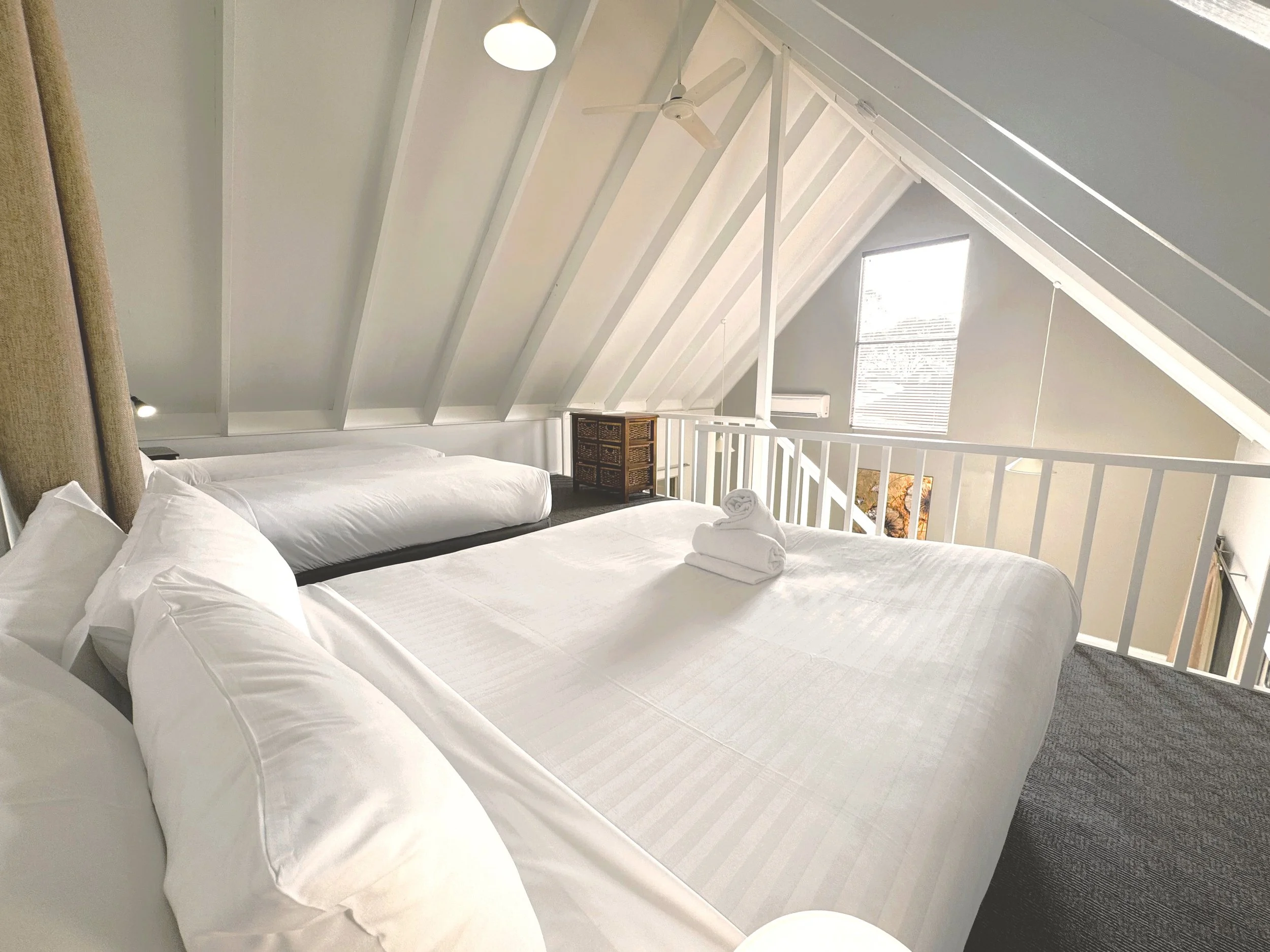 Chalet 12 loft bedroom.jpeg