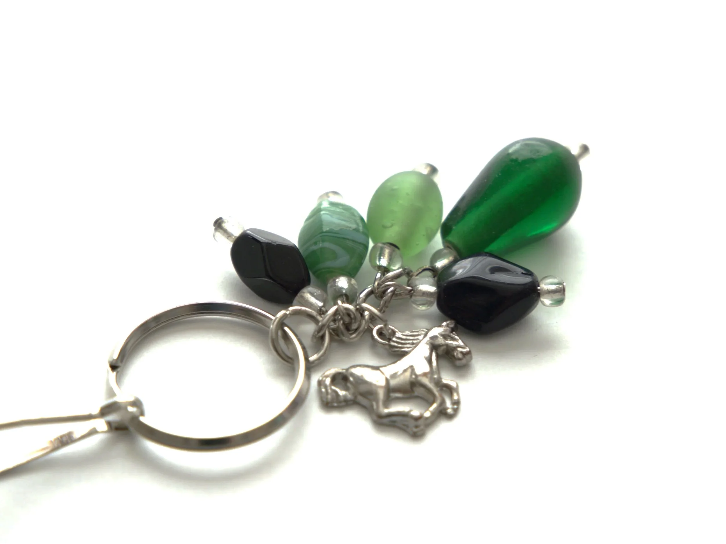 K48+Horse+Dark+Green+Lt+Grn+Swirl+Facated+Blk+Clear+Grn+1.jpg