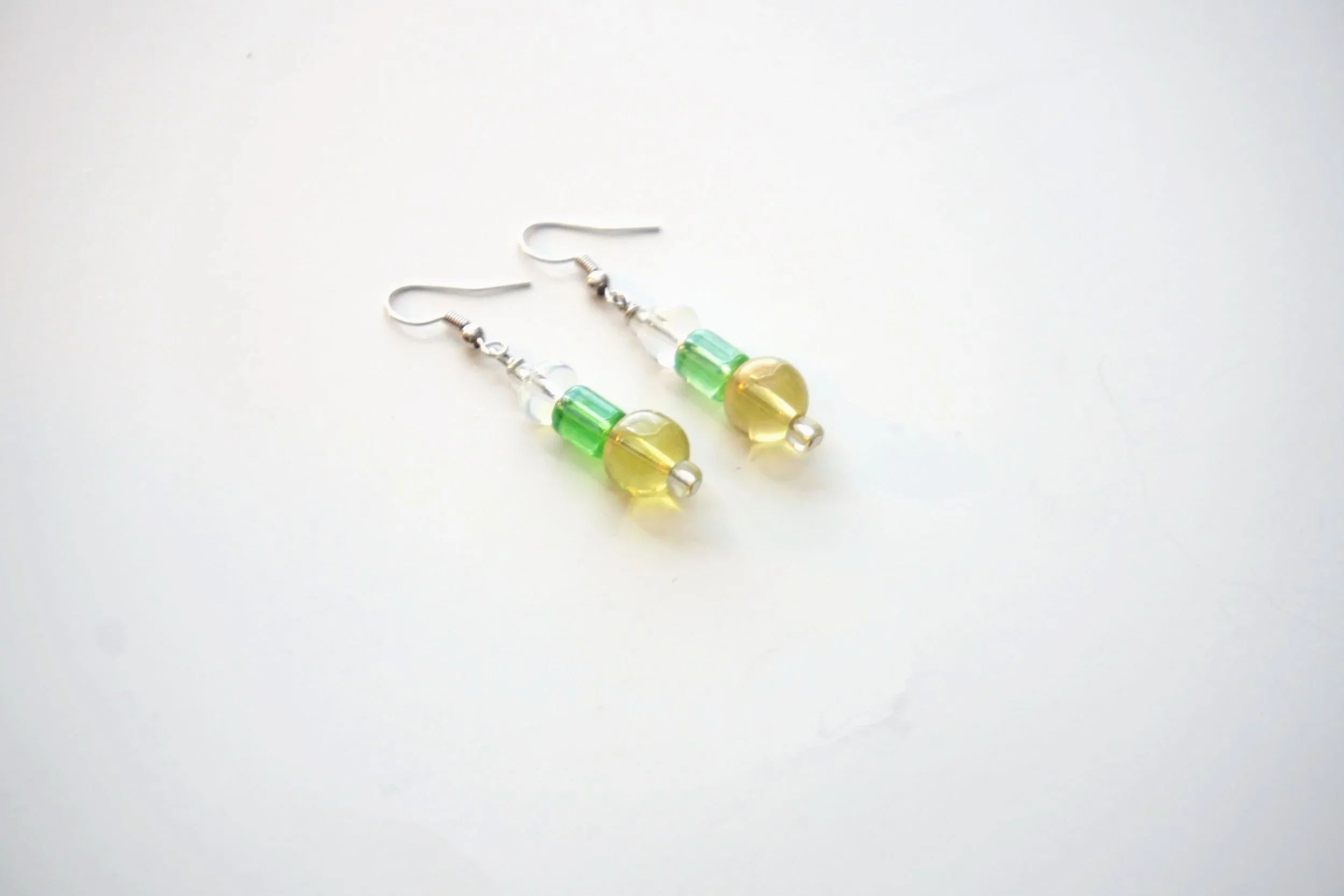 E61+Round+yellow+and+green+glass+bead+earrings+1.jpg