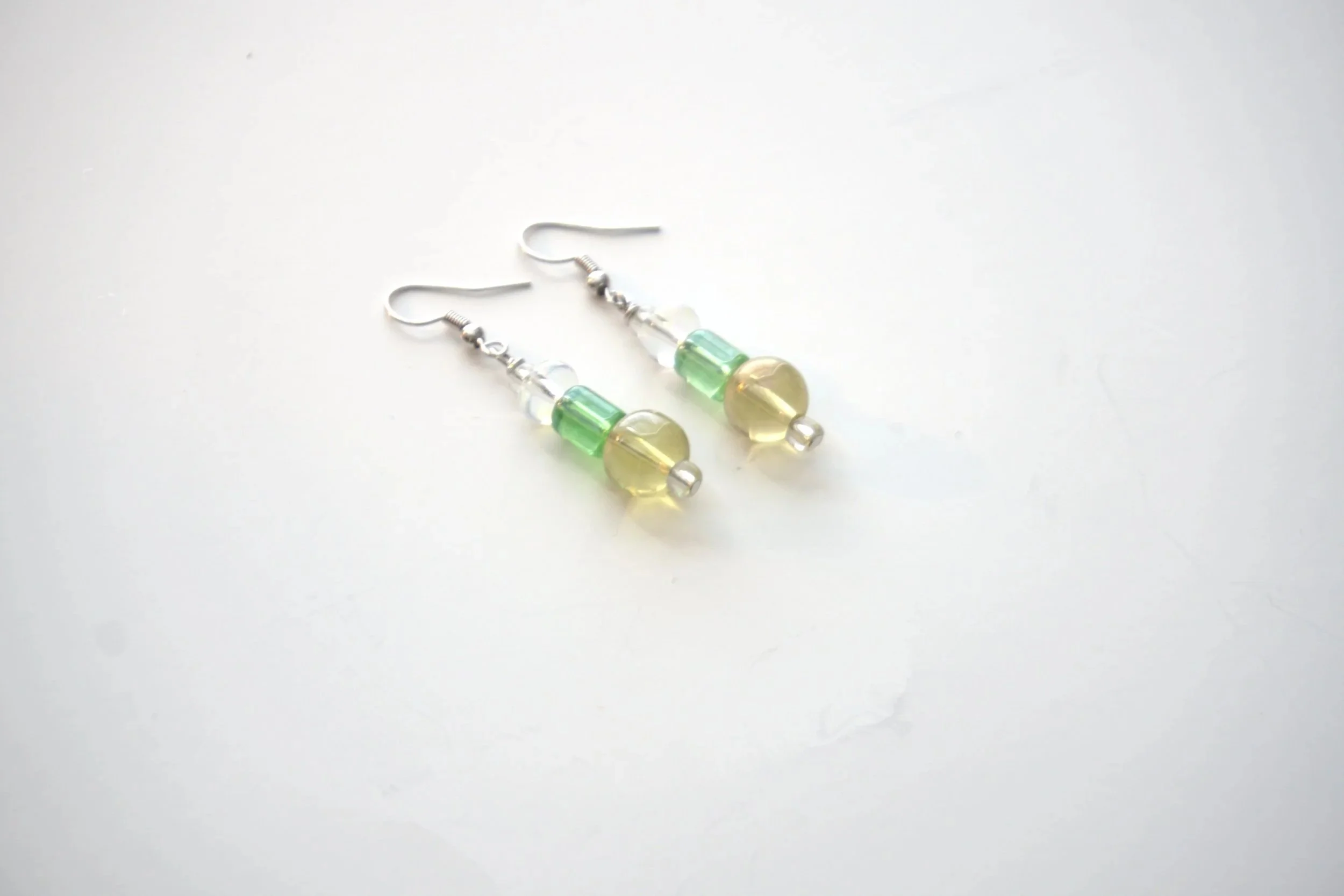 E61+Round+yellow+and+green+glass+bead+earrings+1.jpg