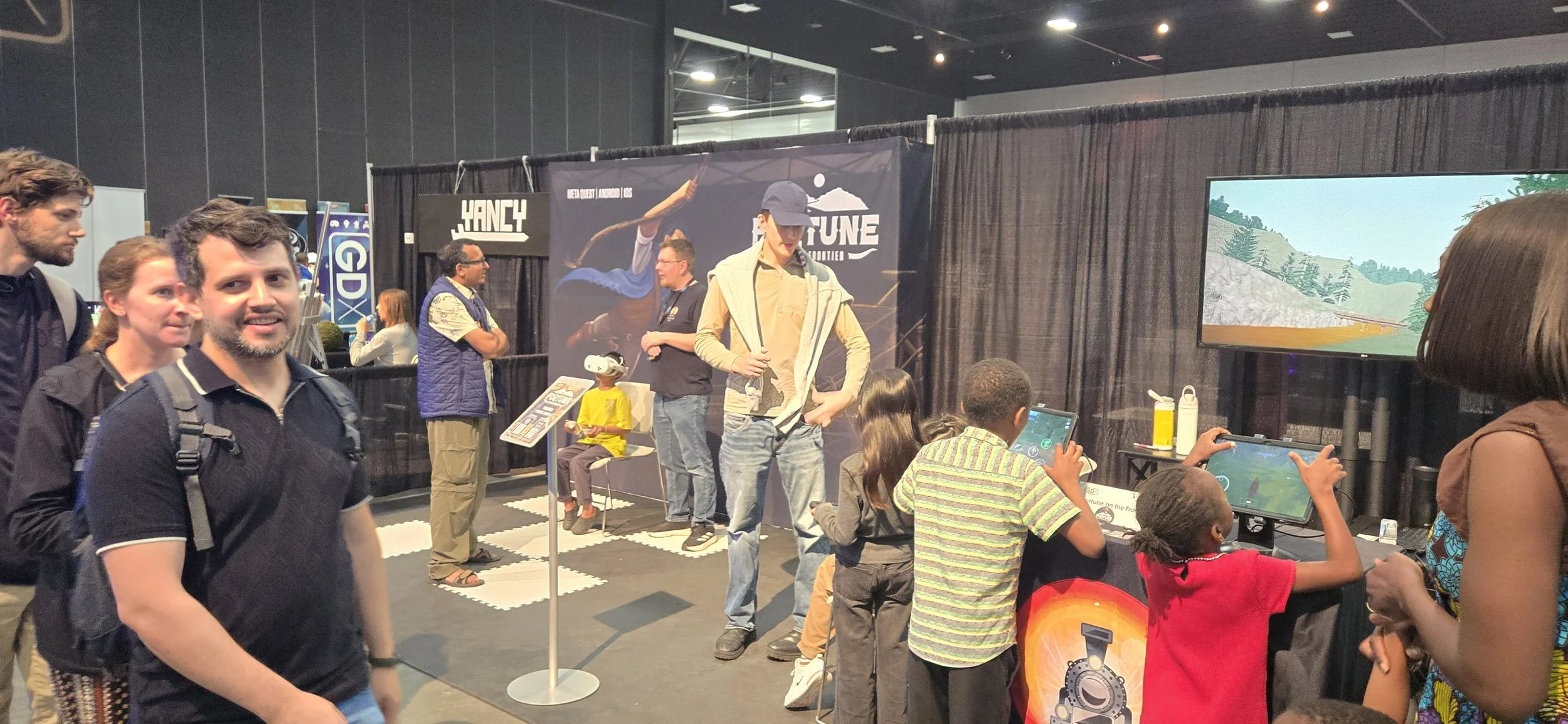 Image of players at the High Level Studios booth at 2025 GDX / K Days in Edmonton.