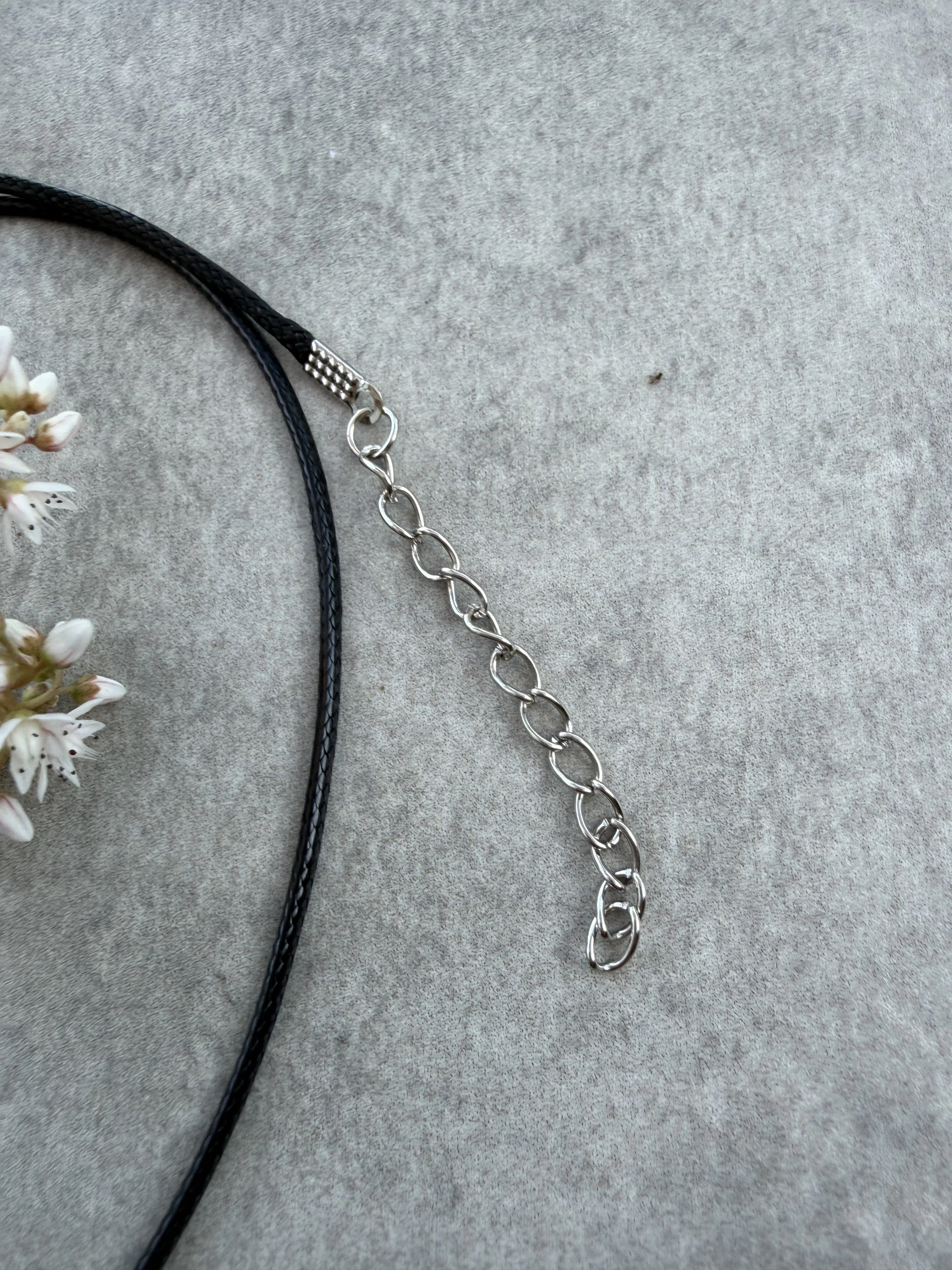 Silver extender chain detail — adjustable length cord included with Moonveil wearable art pendant