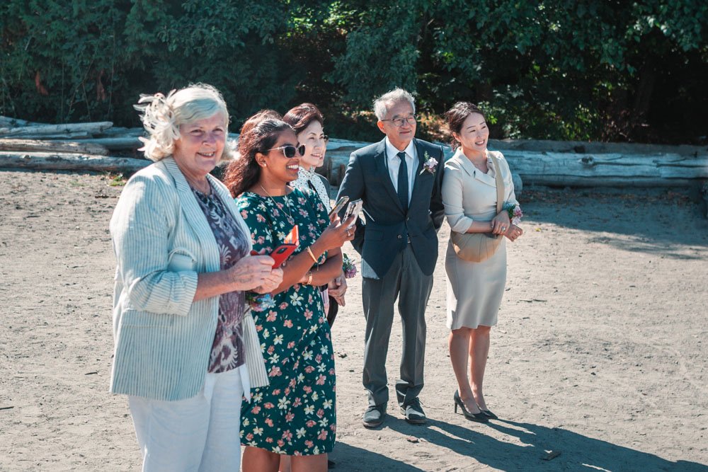 small family group at a beach elopement