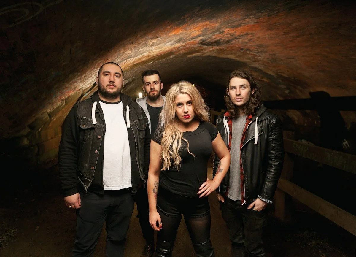 Band photoshoot in a tunnel under the railway