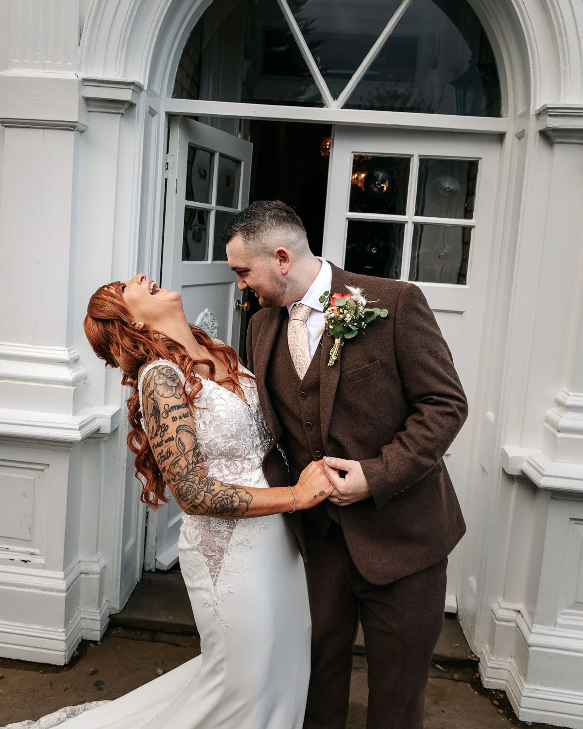 bride and groom laugh at Dunedin Country House