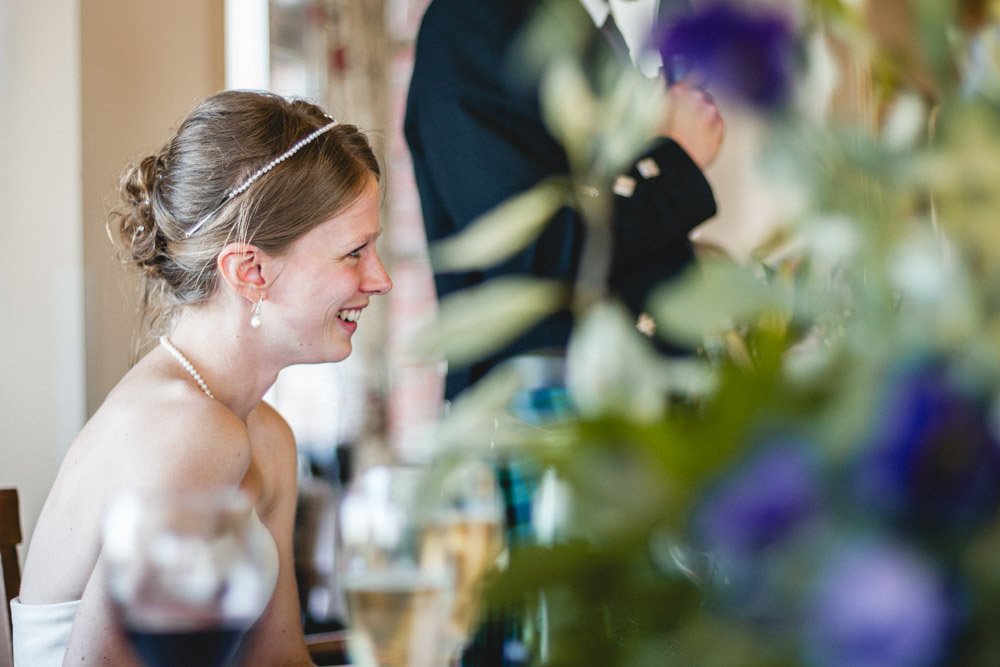 bride laughs at best man's speech