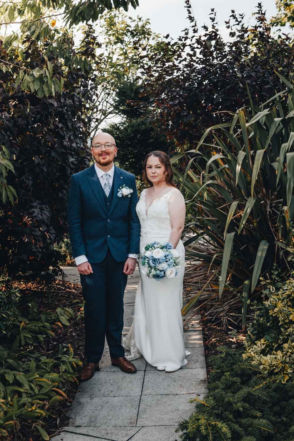 bride and groom in the garden at Goosedale