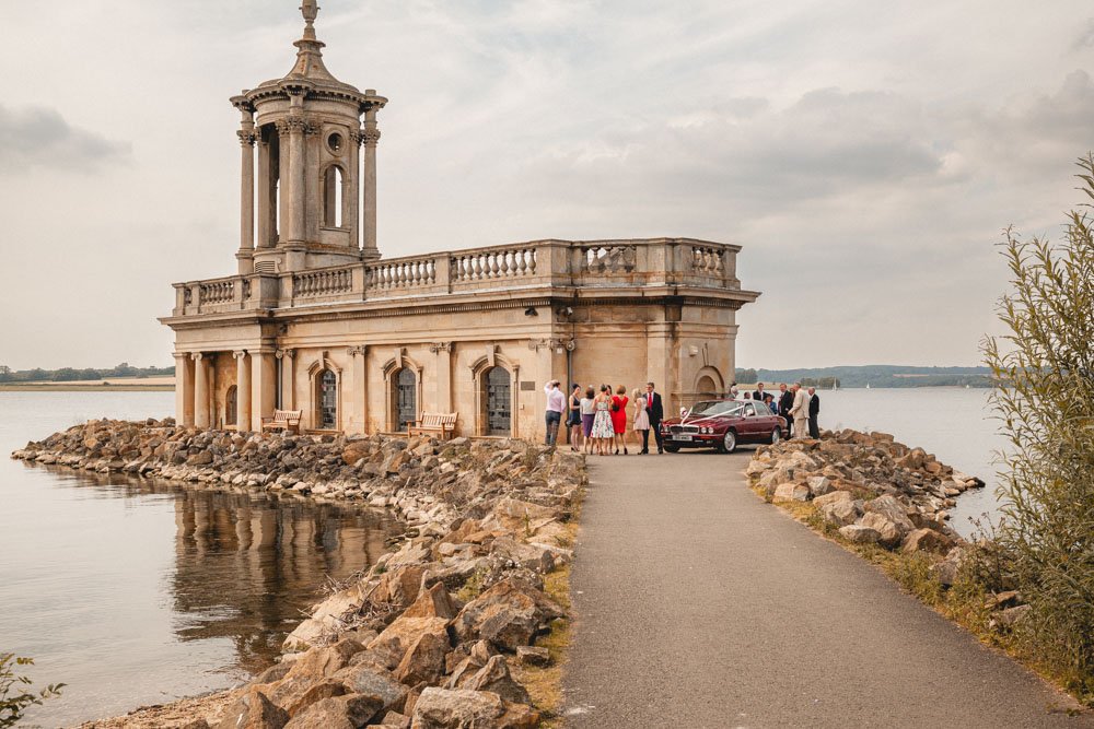 guests gather outside Normanton church on Rutland Water