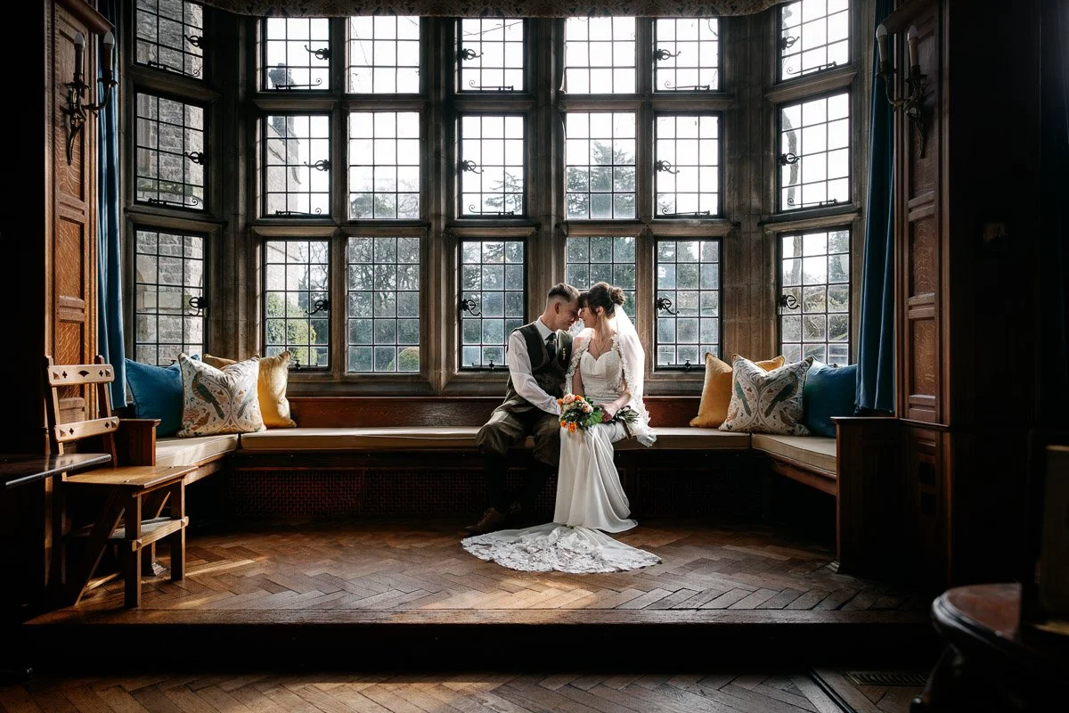 Bride and Groom in the library at Tissington Hall