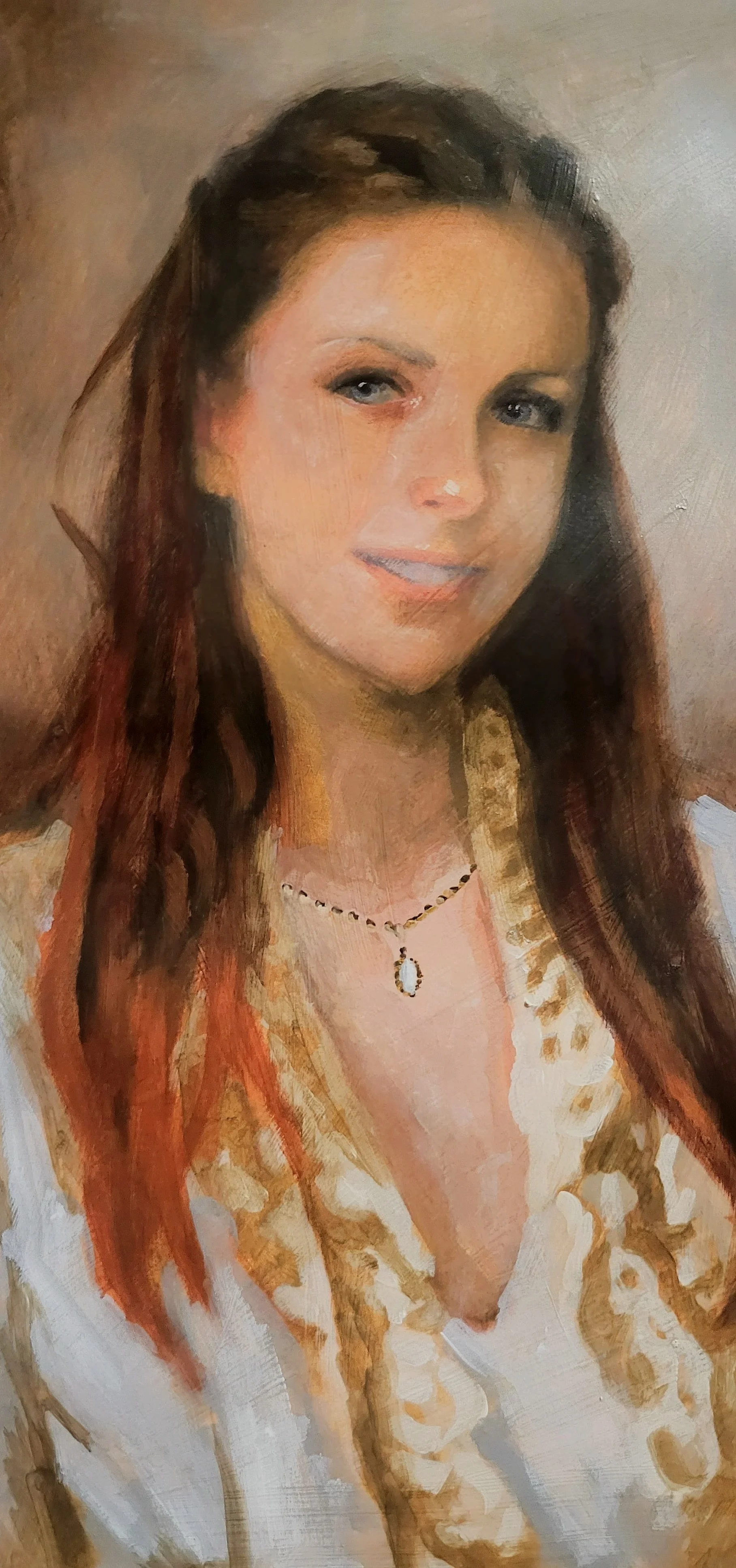 Portrait of a woman with long auburn hair, wearing a gold-patterned dress and a black necklace with a pendant.
