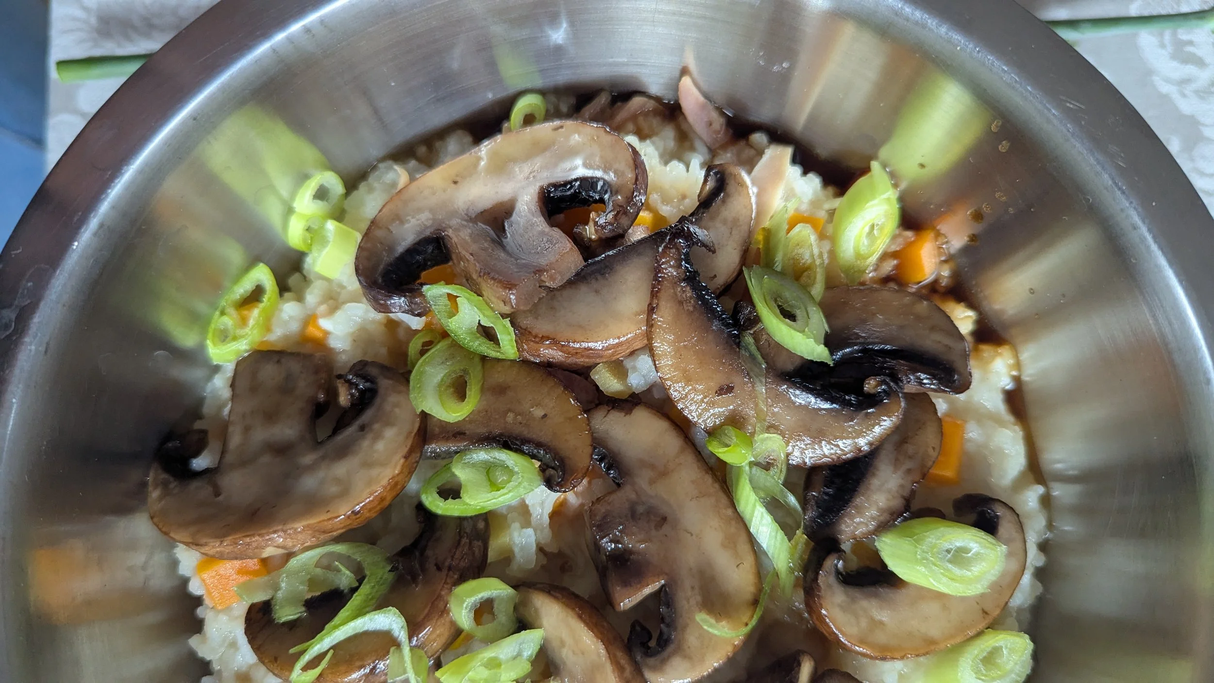 Slow cooked Chicken congee with earthy mushrooms