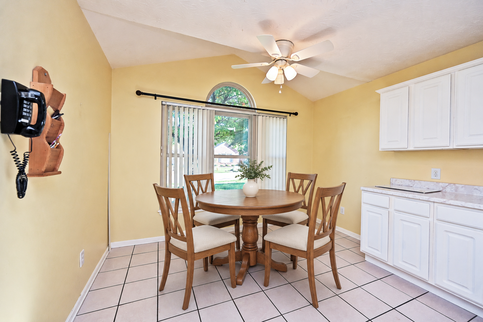 Oak dining set in breakfast nook.png