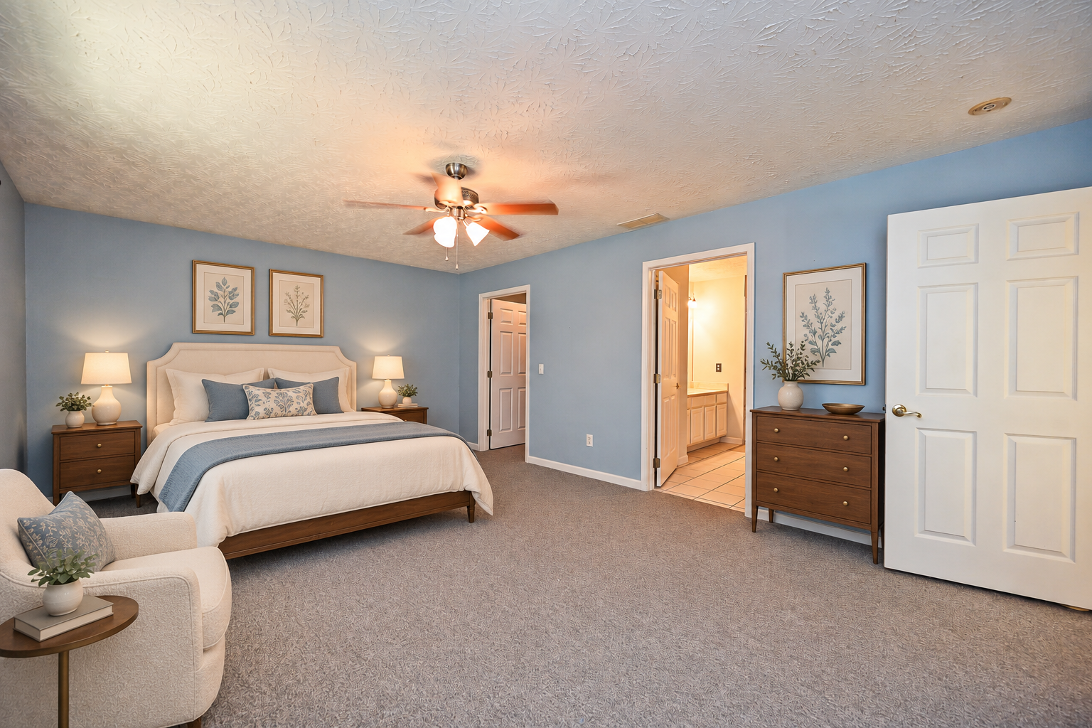 Refined ivory bed in blue bedroom.png