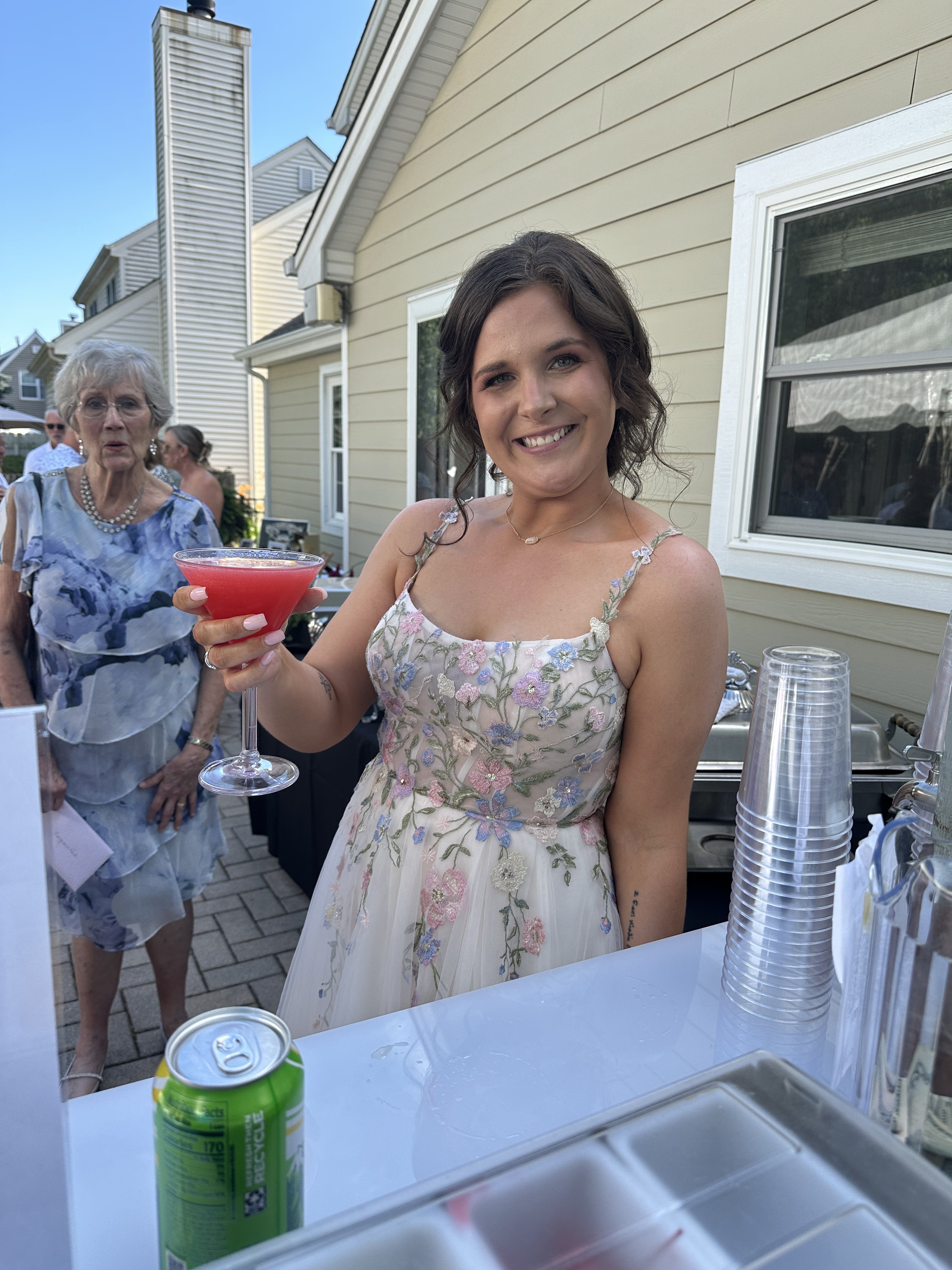 Our beautiful bride Carly holding her signature drink