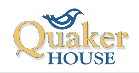Logo for Quaker House featuring a stylized bird above the words 'Quaker House' in gold and blue.