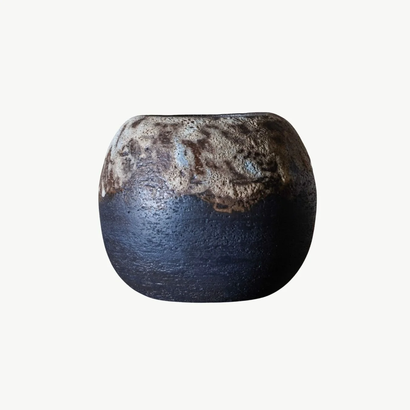 Jackie Ankelen black clay and magma vase.jpg