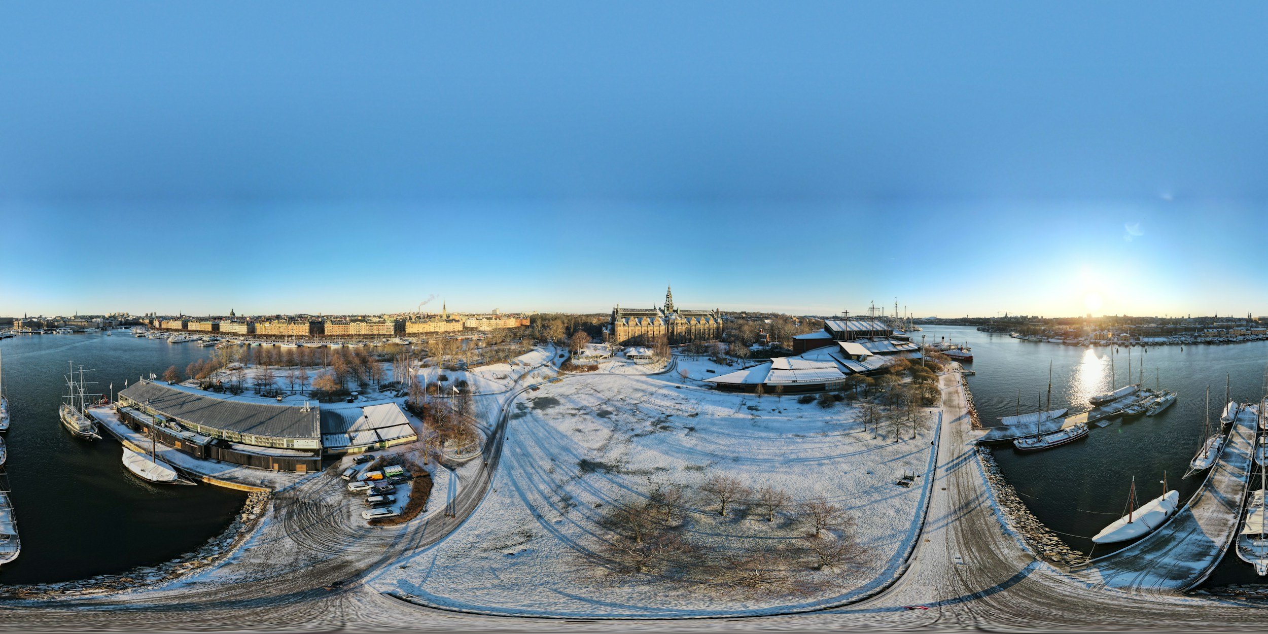 Aerial 3D scan of a construction site showing areas of cleared land, piles of debris marked with red and green, and designated zones outlined in green for different materials or sections, with overlay data on terrain measurements on the left side.