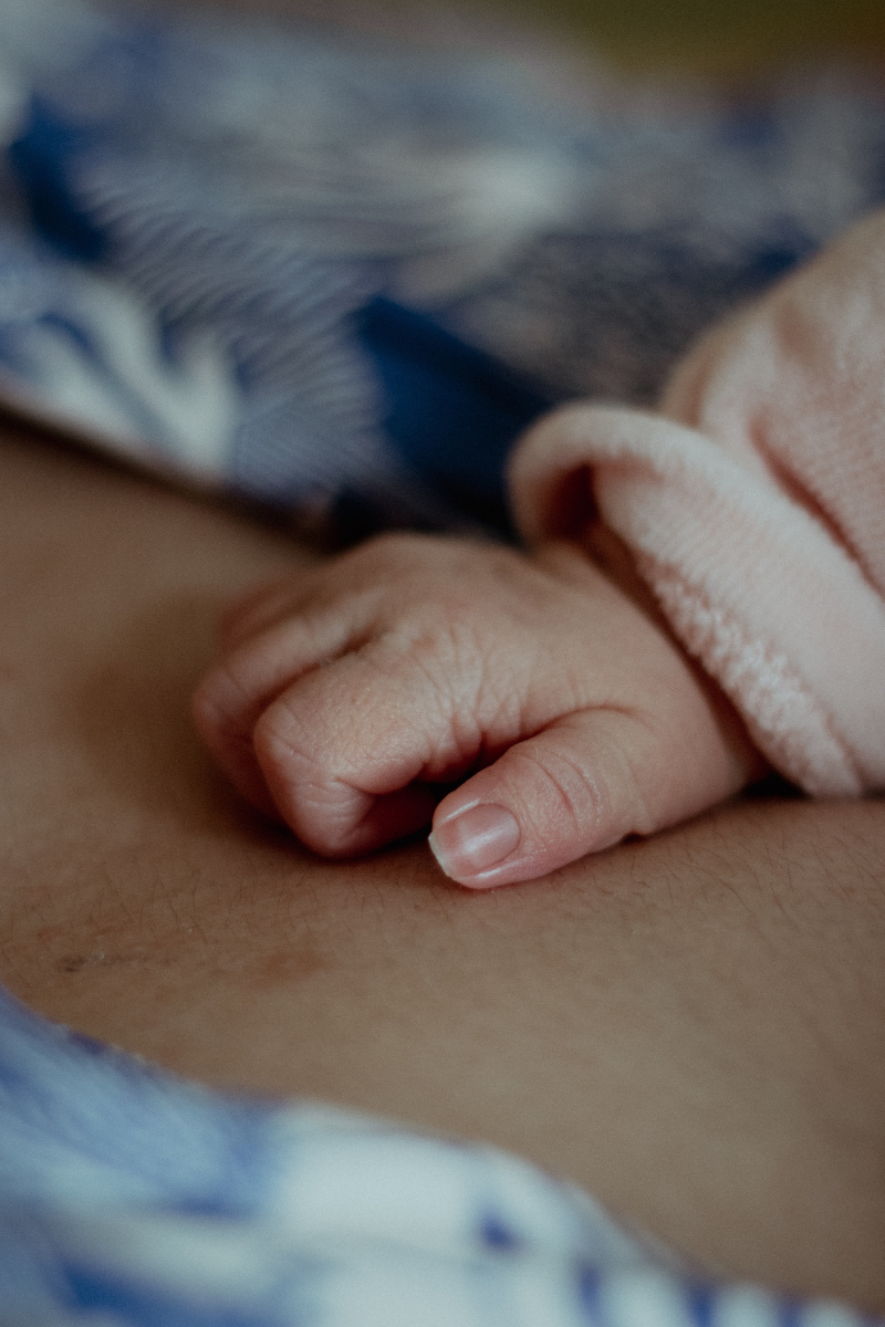 babyhandonchest.png