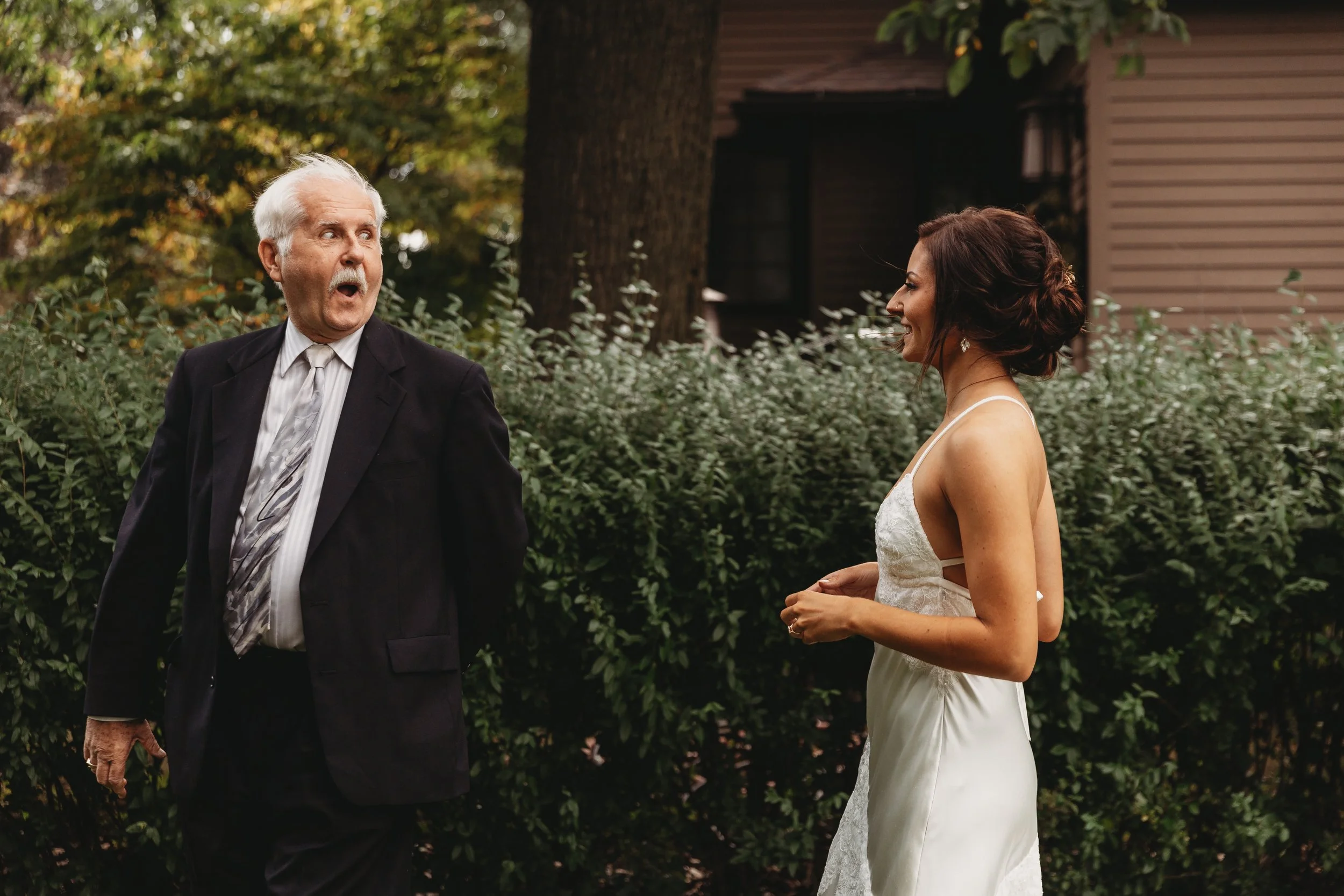Surprised Father seeing Daughter Bride for first time in Skaneateles New York Wedding.