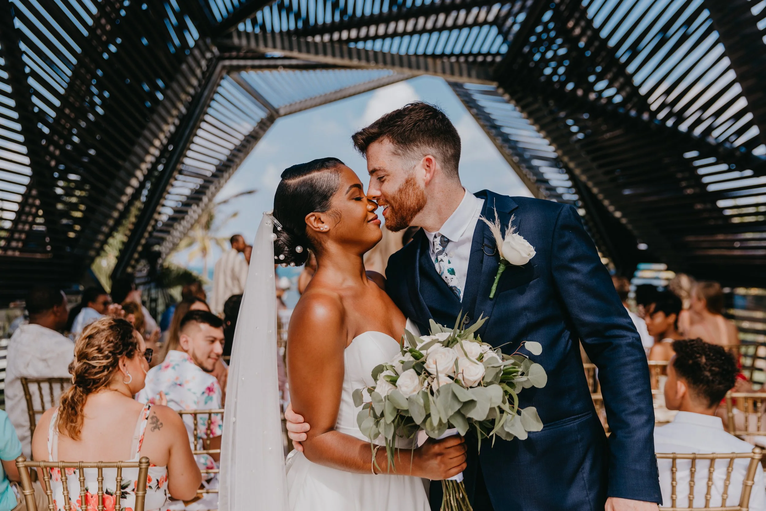 Wedding couple laughing after Riviera Maya Cancun Mexico wedding ceremony.