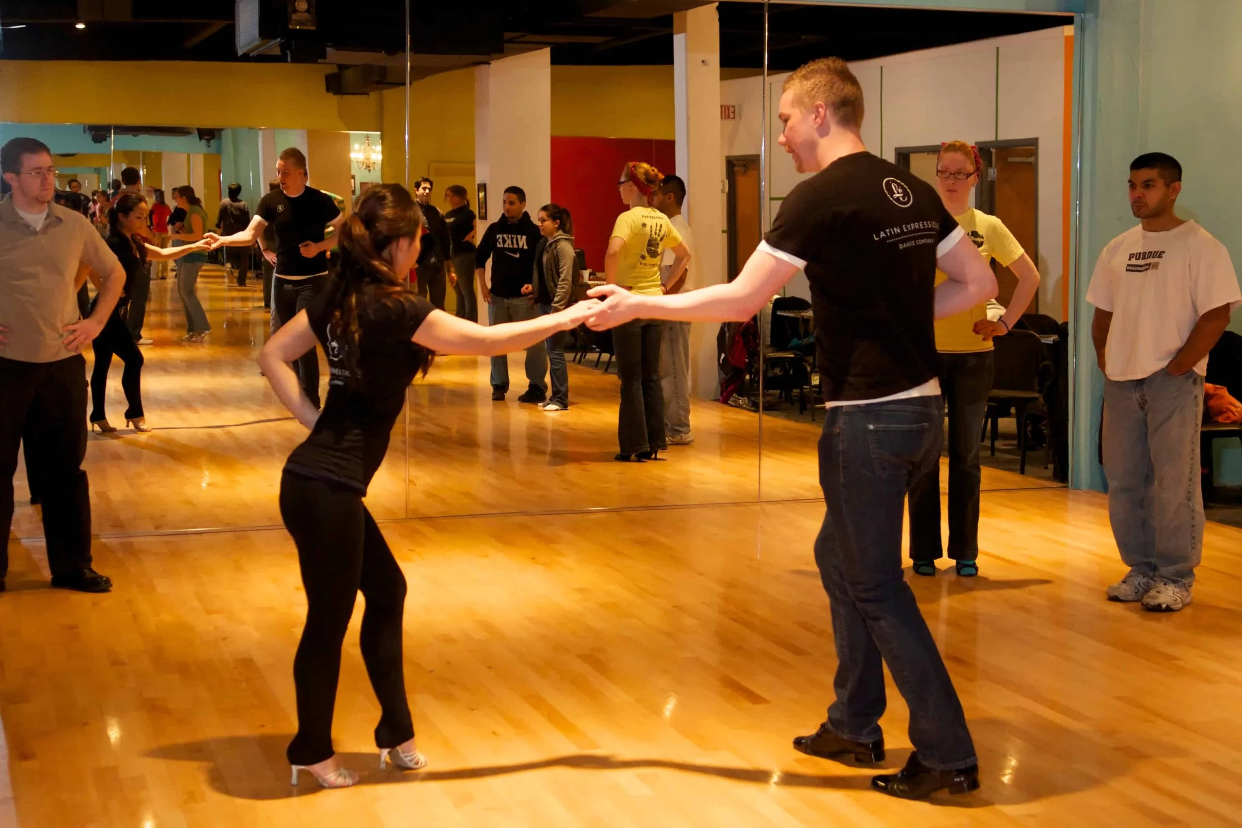 Kyle Cullman instructs a dance class at Latin Expressions Dance Studio Indianapolis.