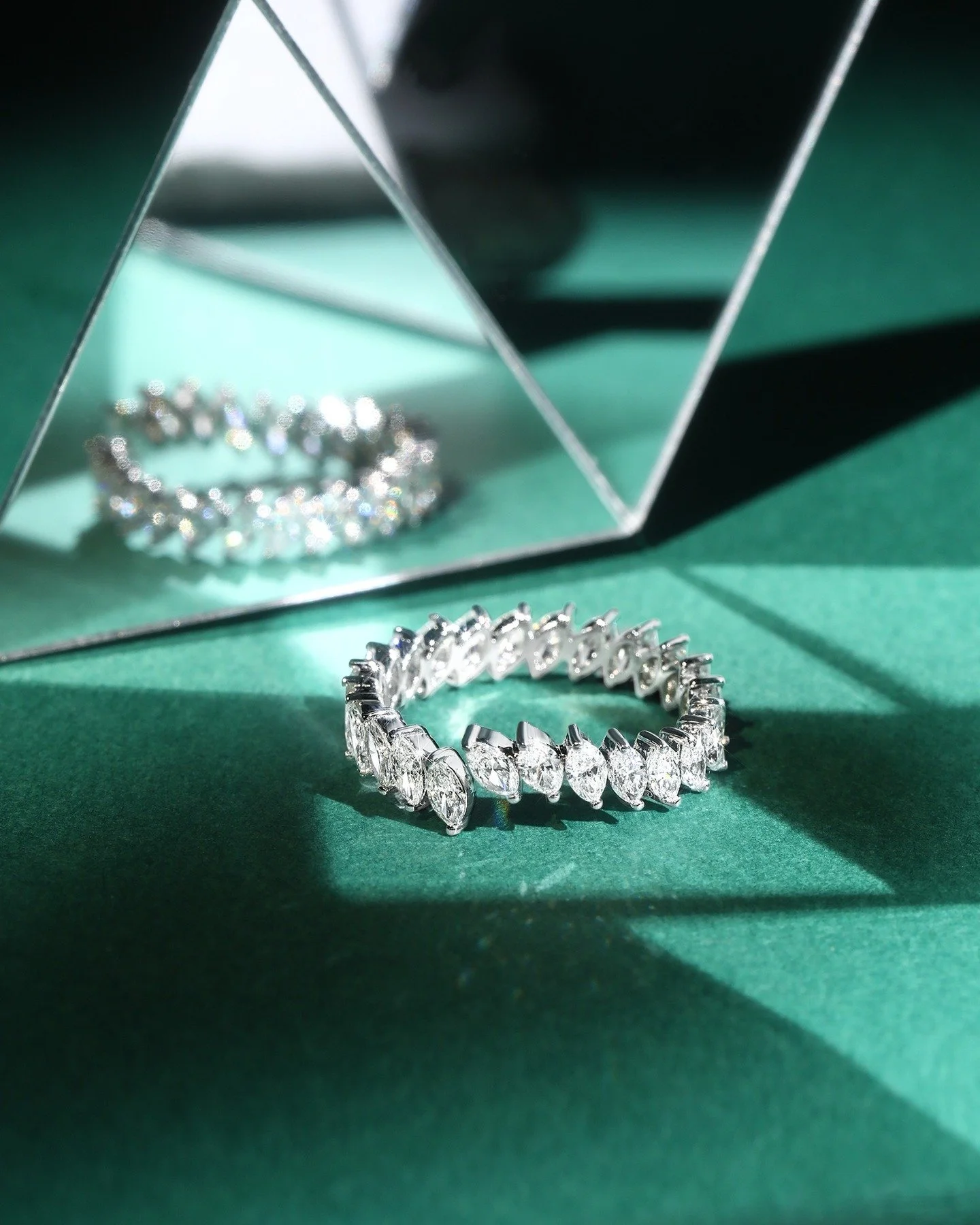 Custom Wedding Band - a marquise diamond eternity band that pairs beautifully with her engagement ring

#jewelrydesigner #customjewelry #finejewelry #danielyujewelry #engagementring