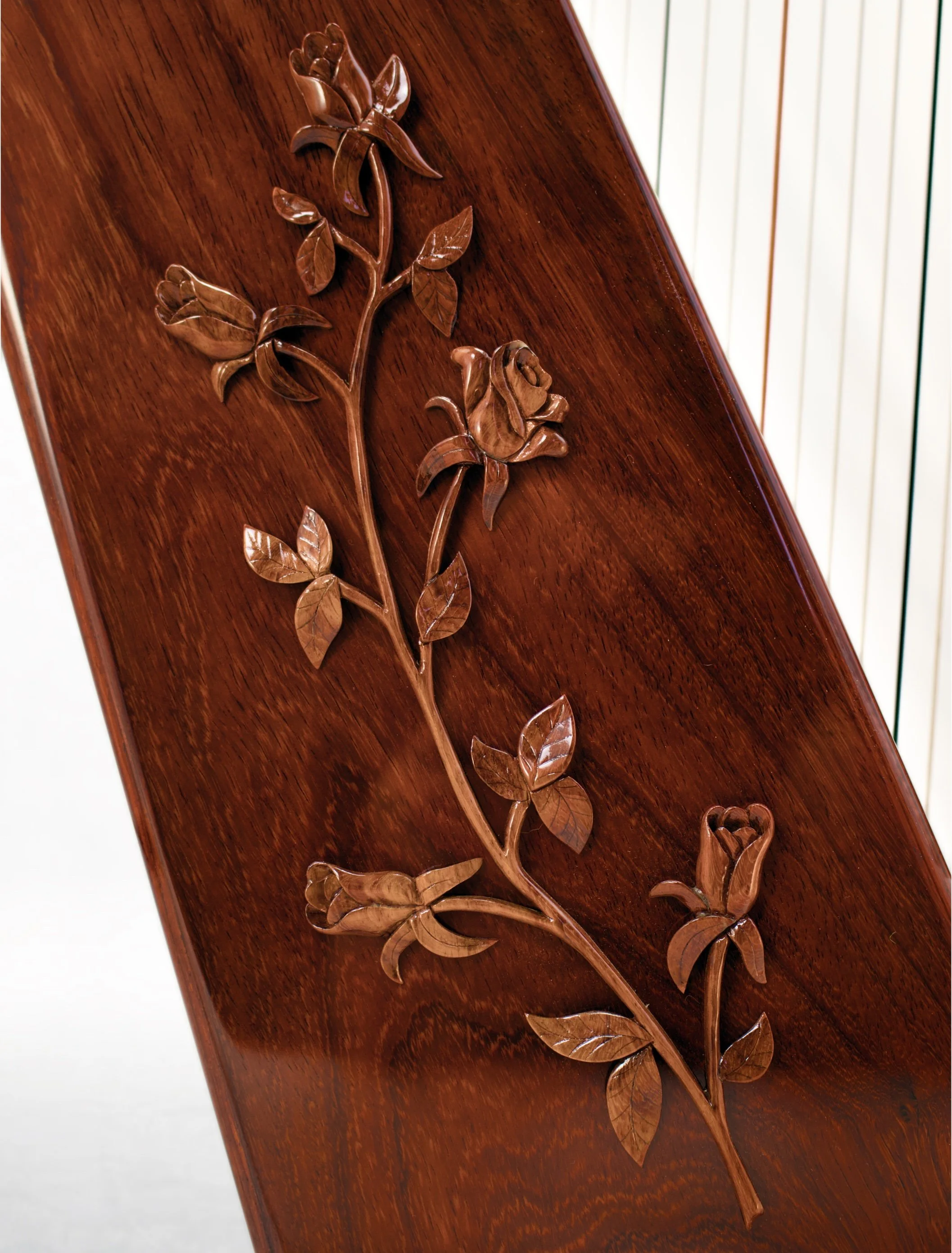 Hand Carved Rose Bud's | One on each side of Sound Chamber