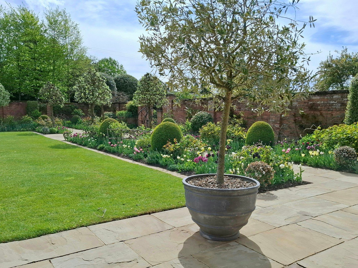 An Inspirational Visit to Morton Hall Gardens - If you get the chance to visit, the gardens are incredible and so well kept. The tulips were just opening when we were there a weeks or so ago and the topiary was acting as a backdrop to the emerging he