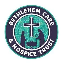 Circle logo of Bethlehem Care & Hospice Trust with a cross, two people, and a baby in a manger, surrounded by a mosaic pattern.