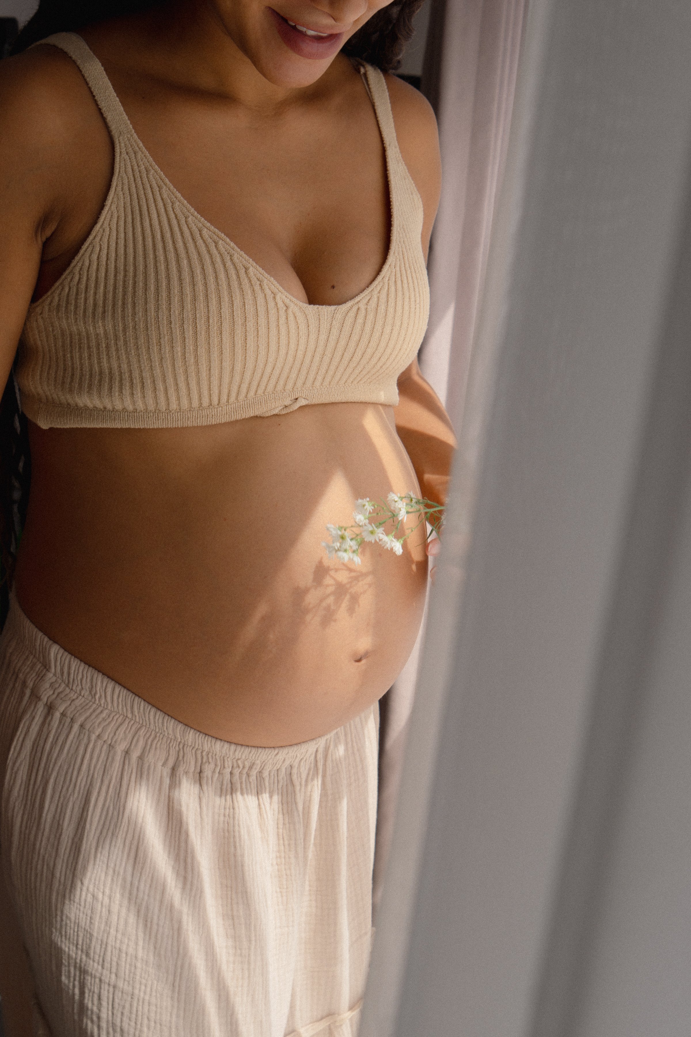 Surrogate confidently carrying intended parents baby