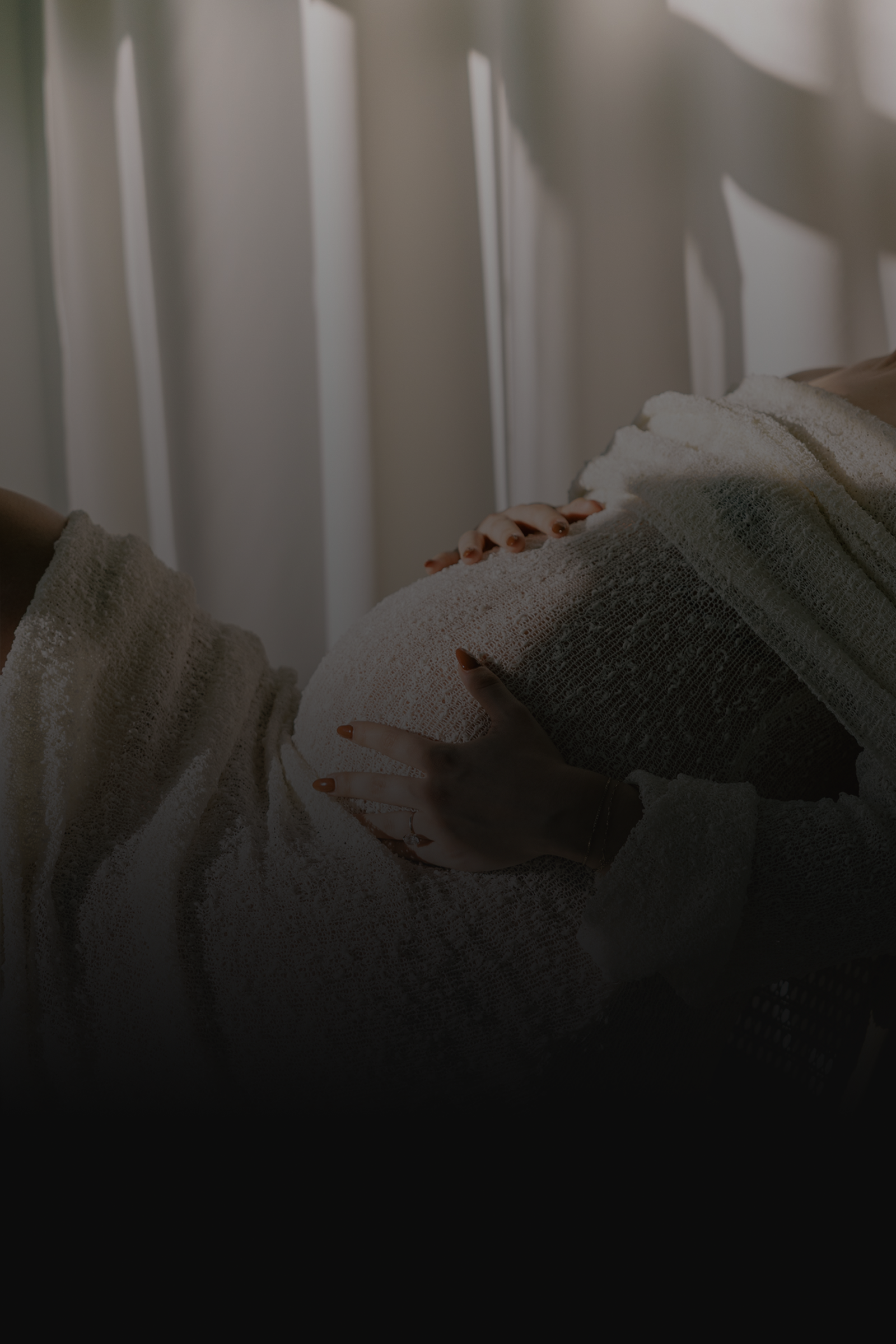A gestational carrier supported by a boutique surrogacy agency.