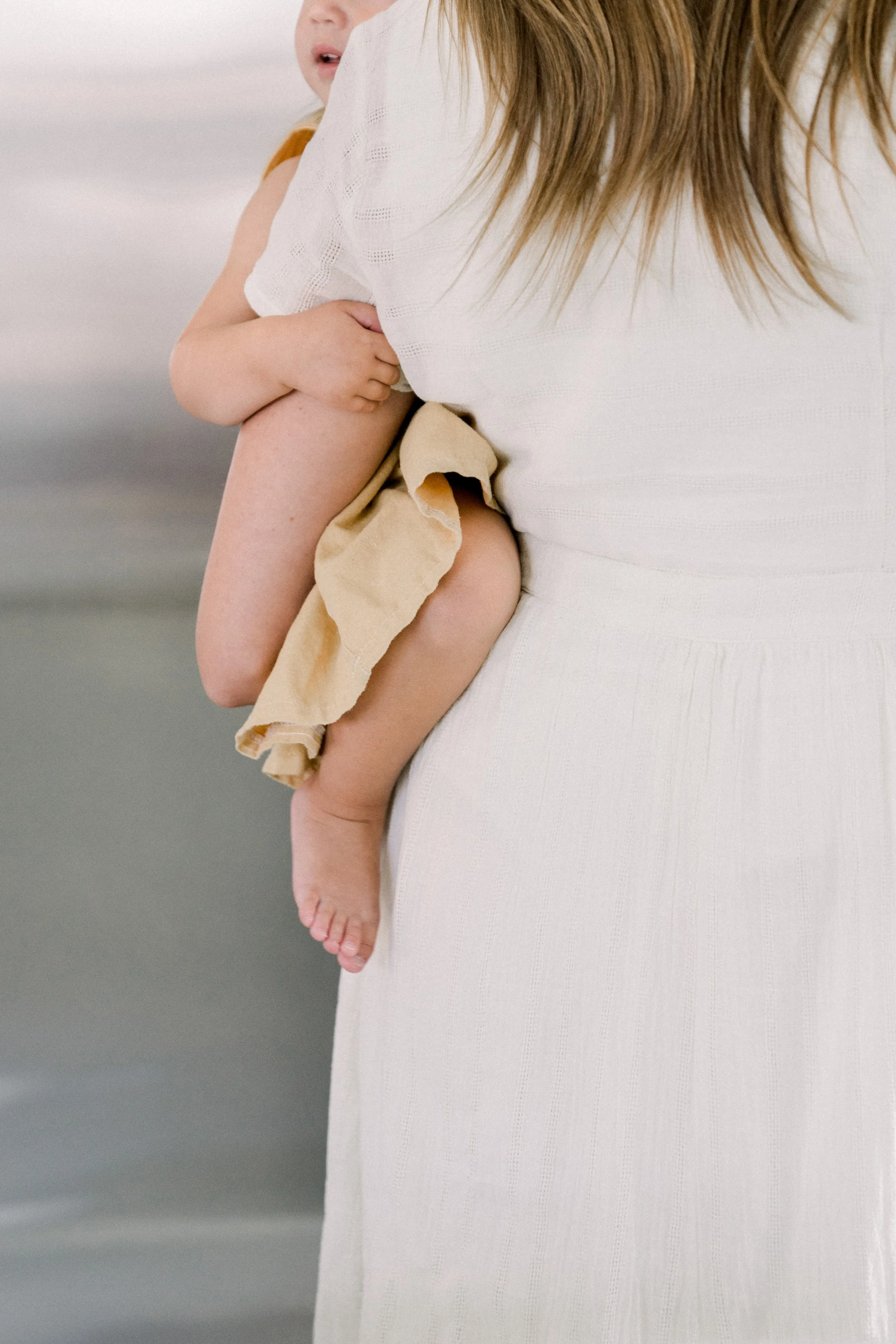 Close-up of mother holding baby