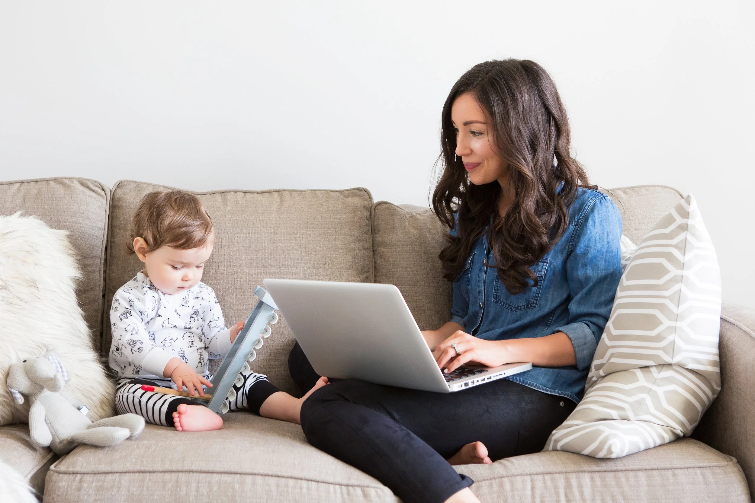 Toddler and Mom sitting on couch