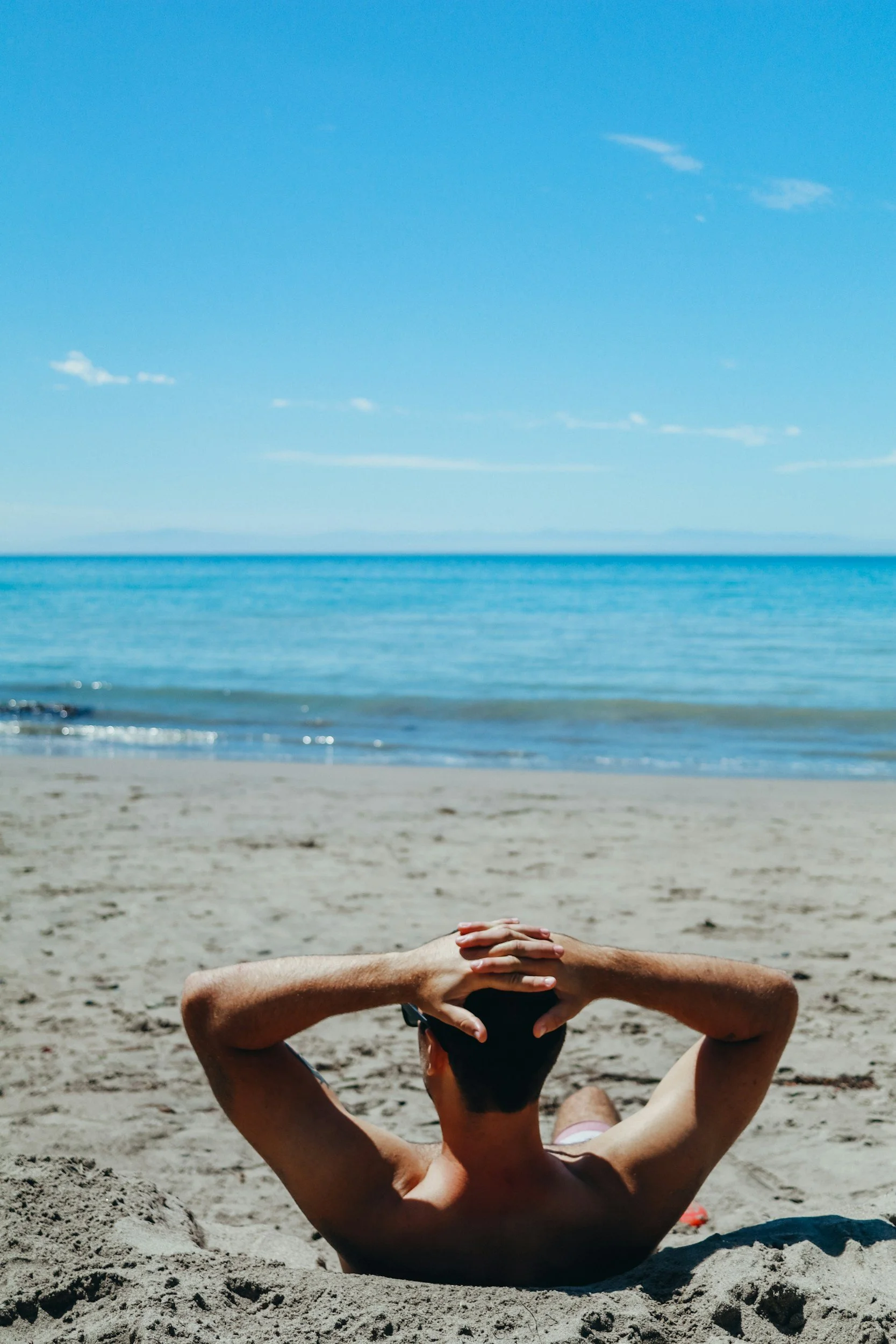 Man travelling solo on beach