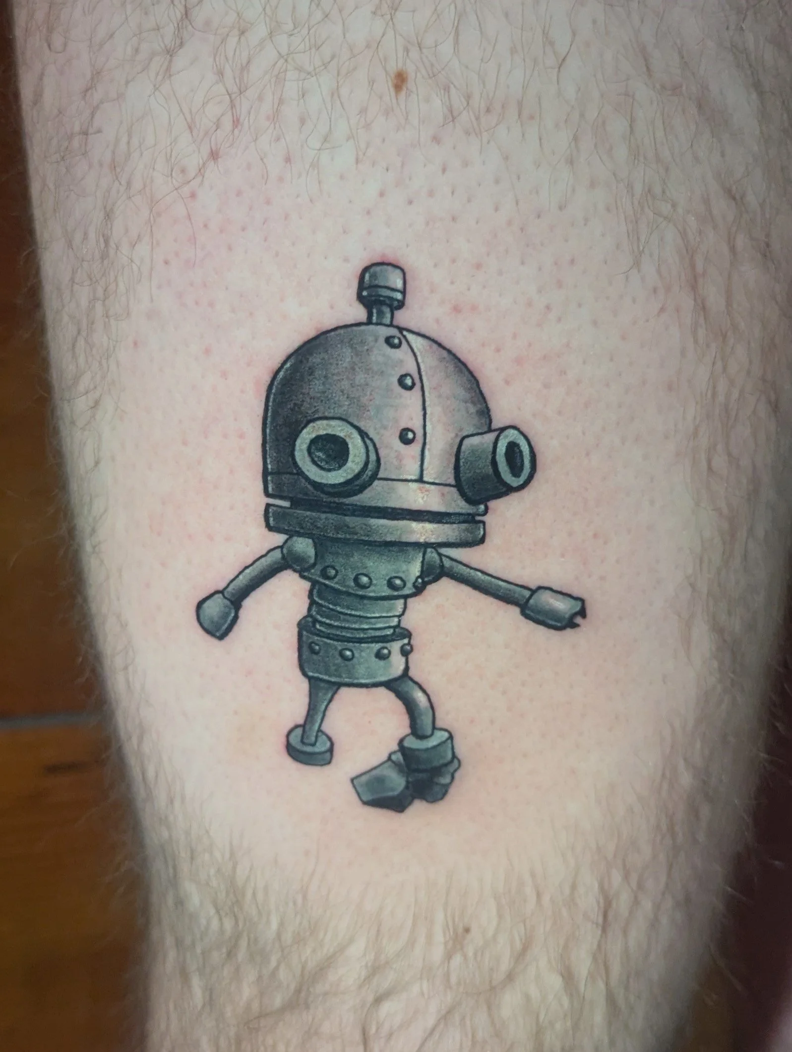 Cartoon_Robot_Tattoo_Kyle_Bernstein_Skies_Afire_Tattoo.jpg