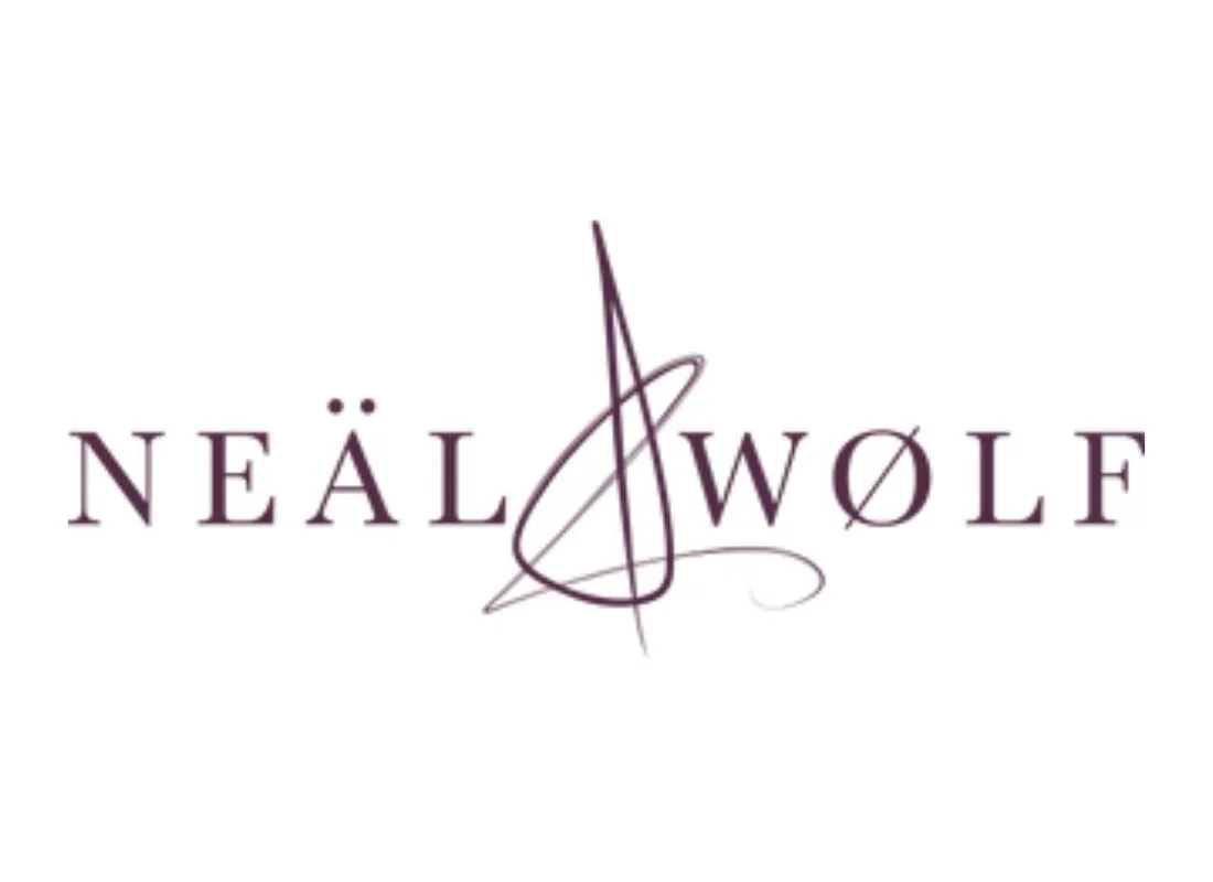 Neal Wolf logo with the name in purple text and an abstract, elegant design in the center.