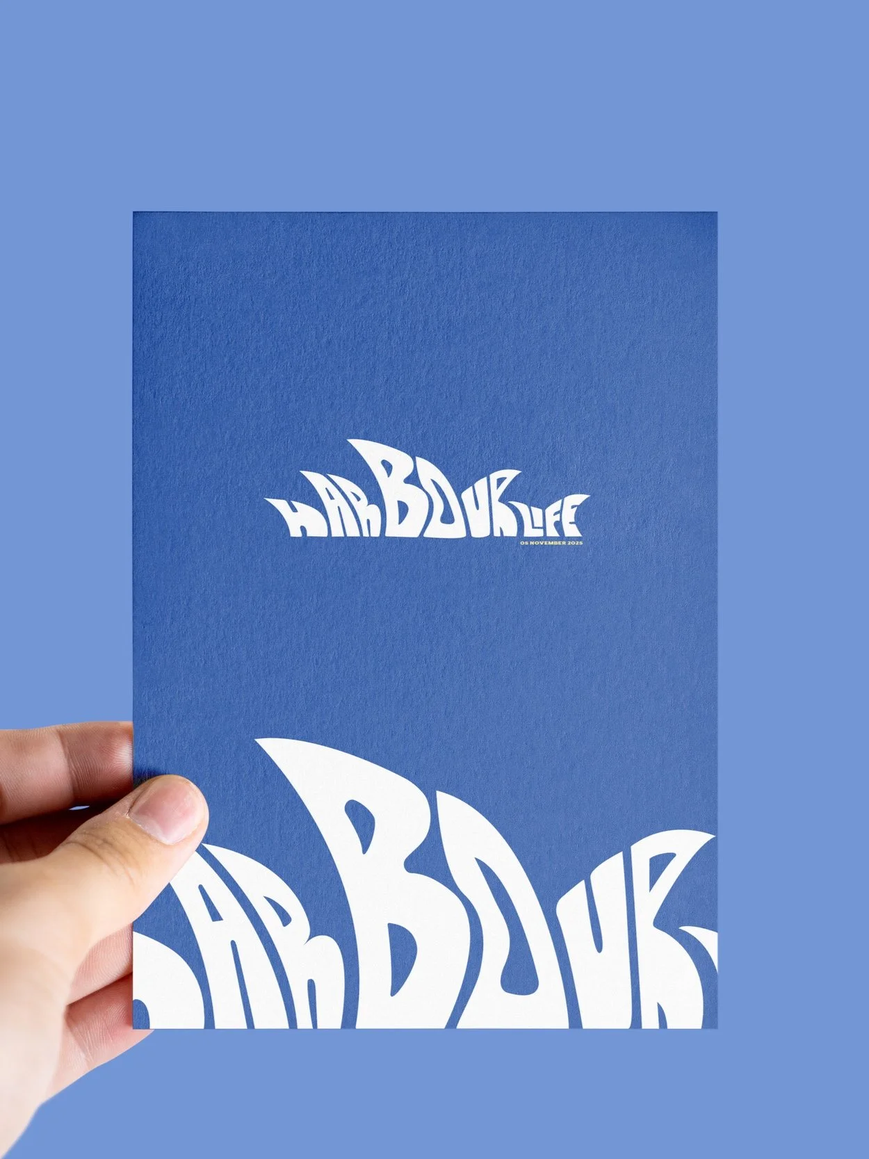 A6+Leaflet+in+Hand+Mockup.jpg