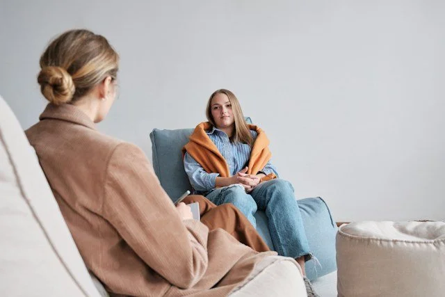 therapist talking with client