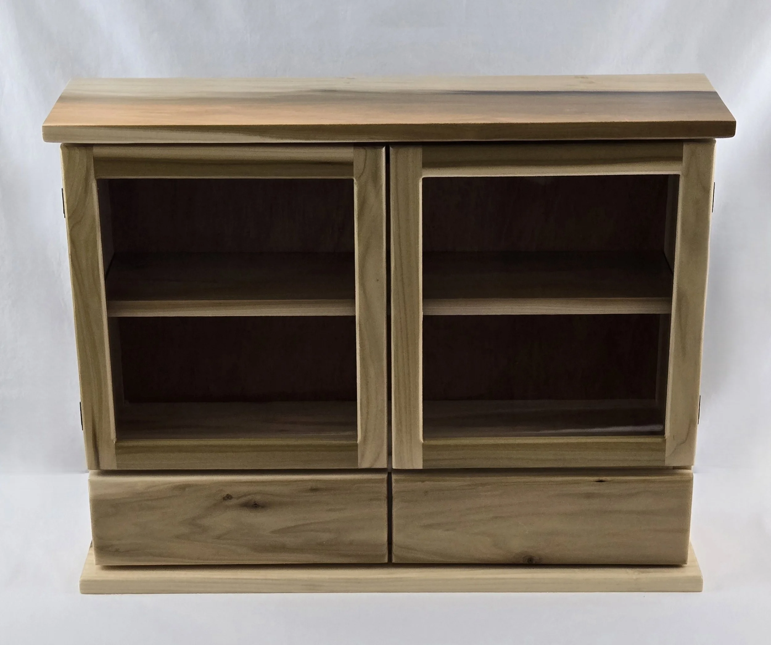 Custom built display cabinet made of poplar.  The customer wanted as much green as we could get.